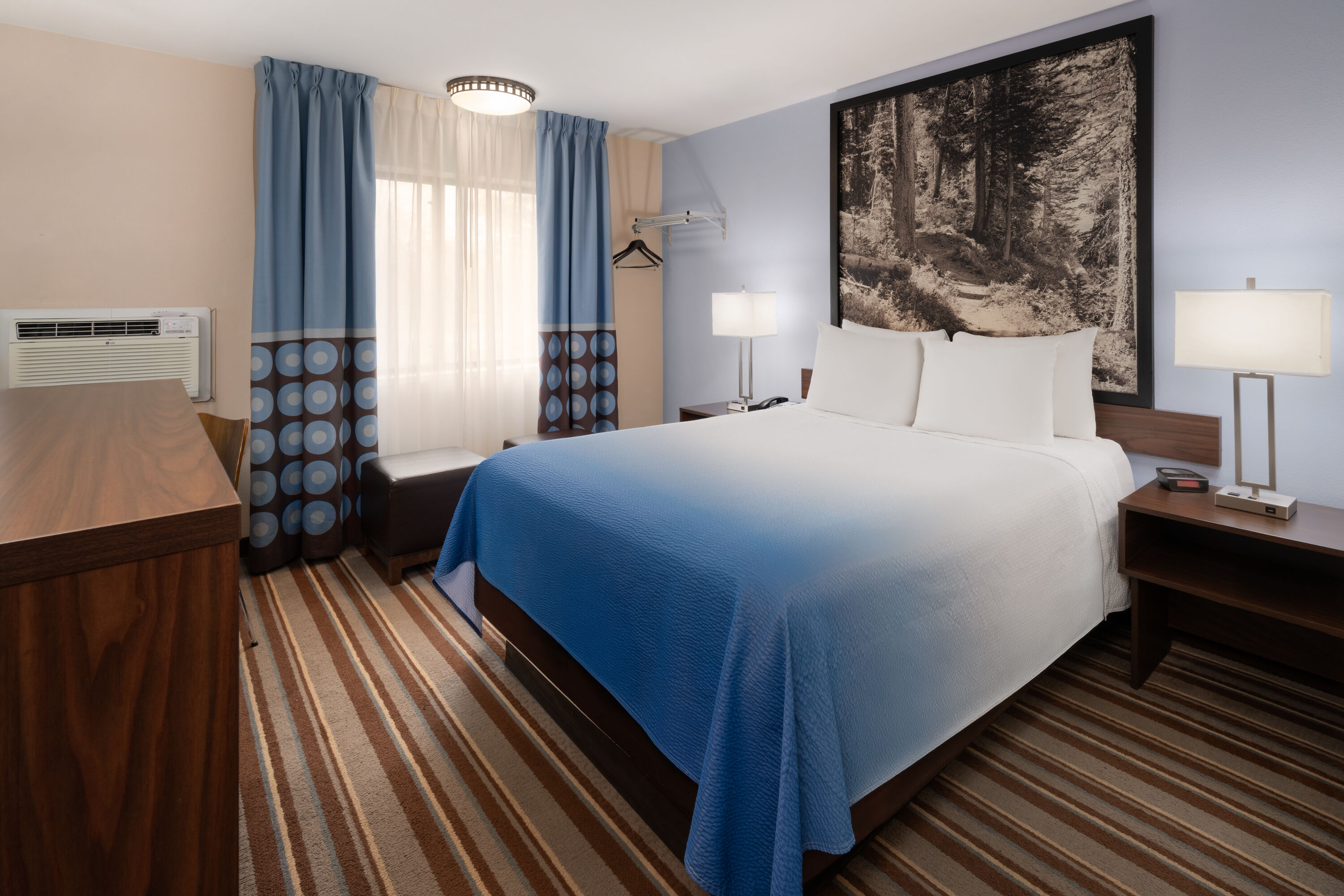 Guest room at the Super 8 by Wyndham Longmont/Twin Peaks in Longmont, Colorado