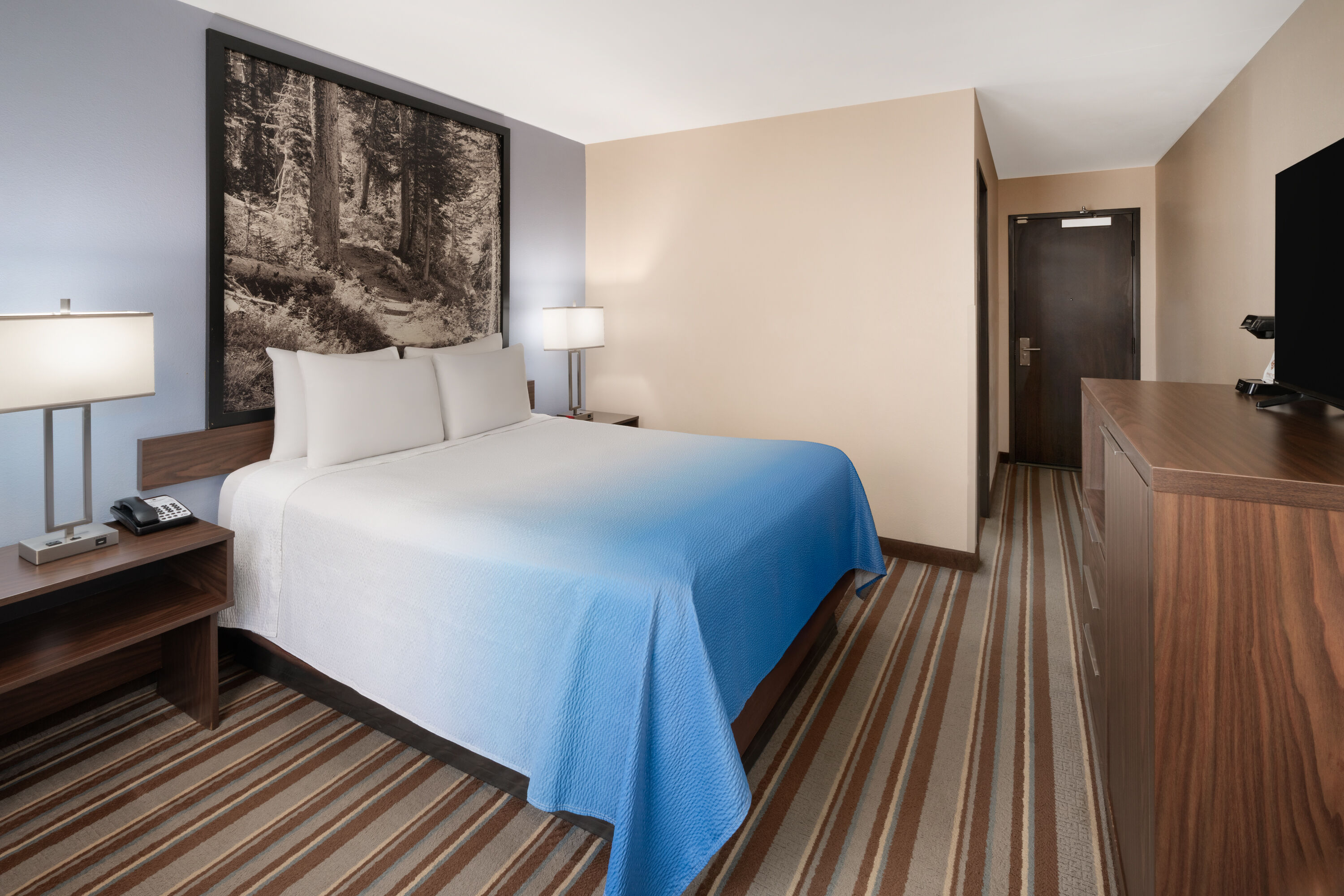 Guest room at the Super 8 by Wyndham Longmont/Twin Peaks in Longmont, Colorado