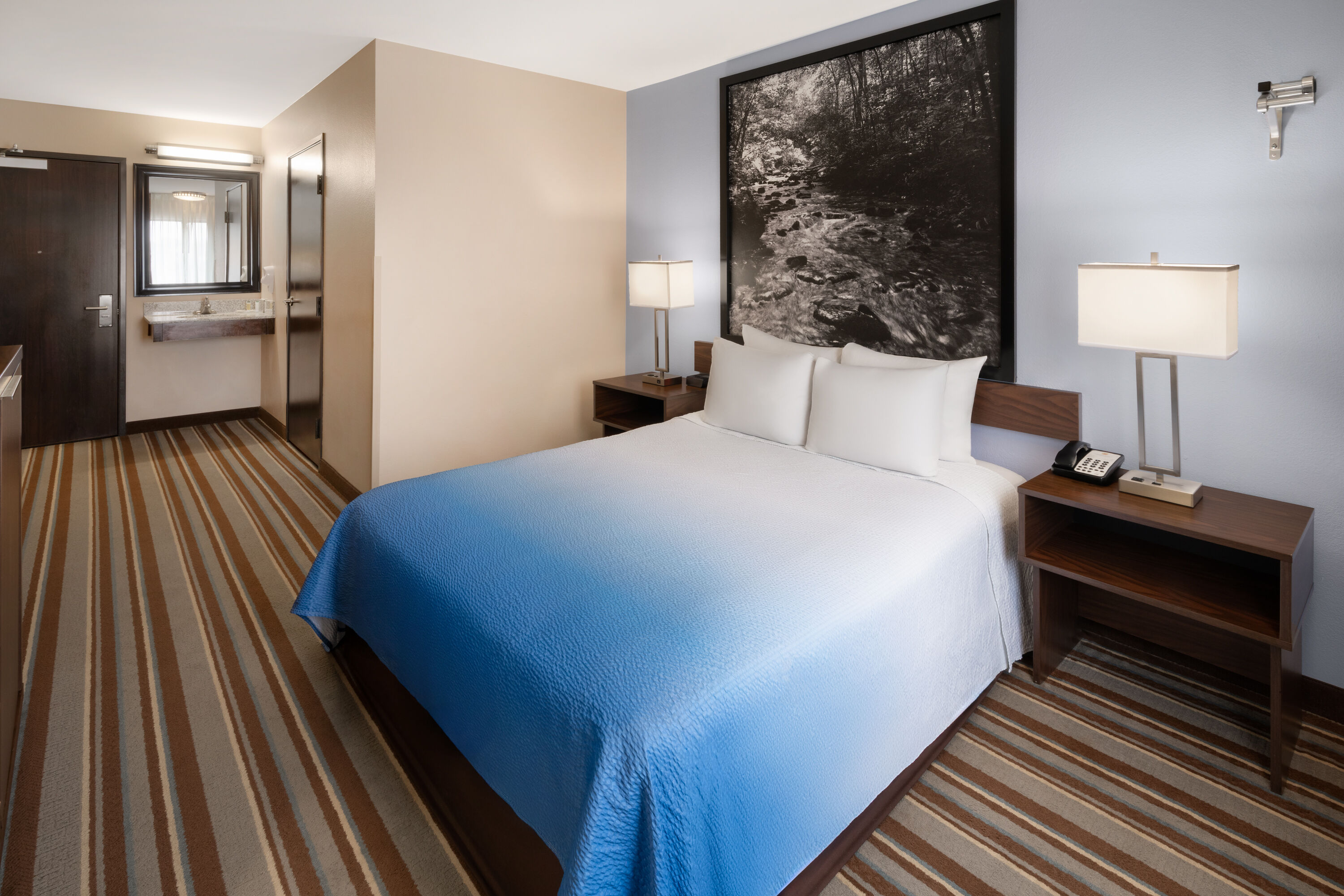 Guest room at the Super 8 by Wyndham Longmont/Twin Peaks in Longmont, Colorado