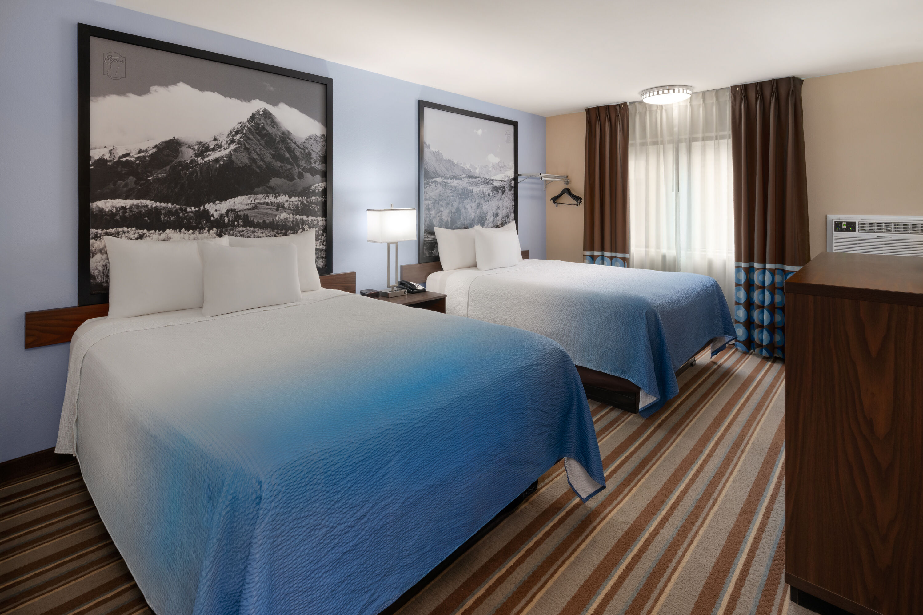 Guest room at the Super 8 by Wyndham Longmont/Twin Peaks in Longmont, Colorado