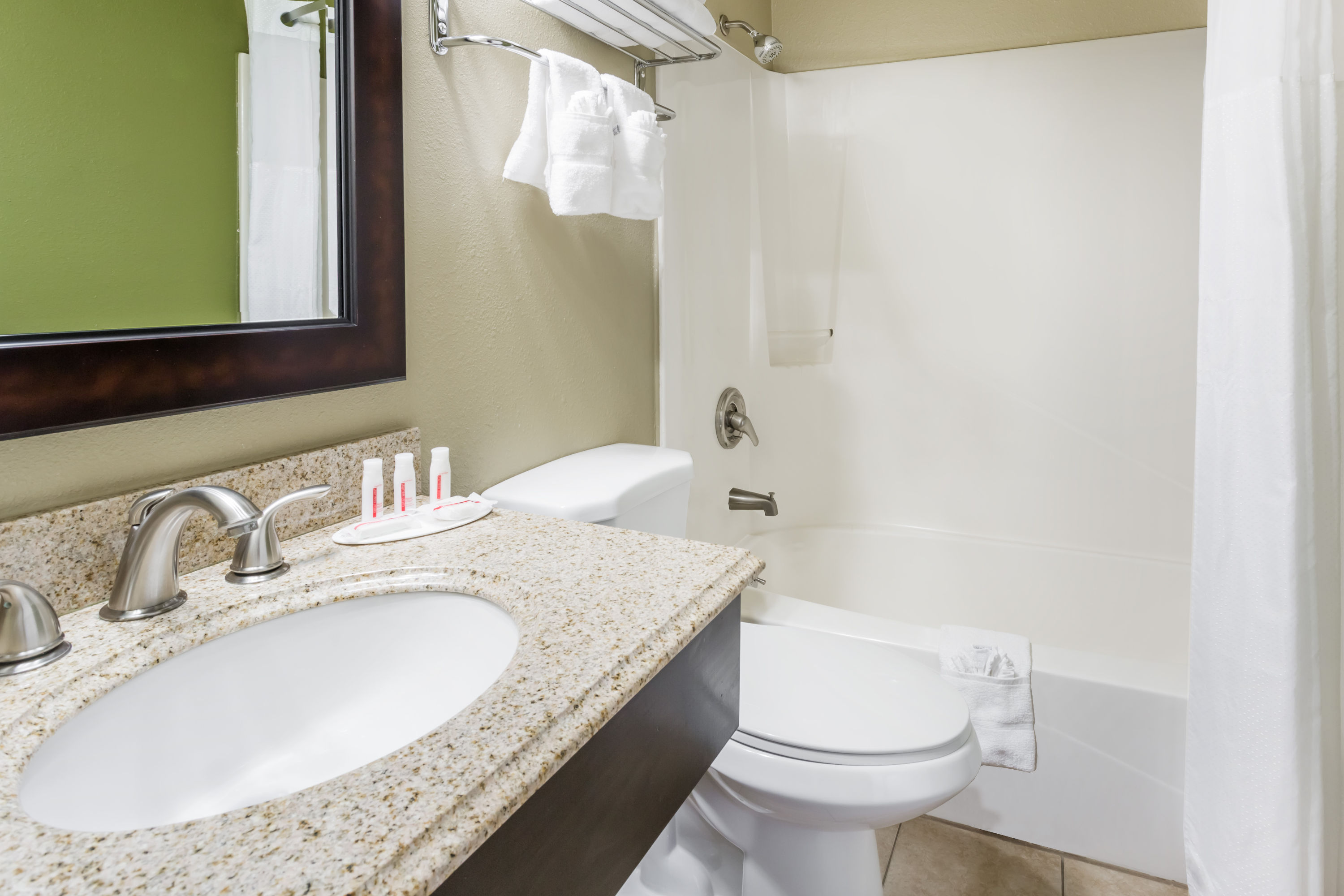 Guest room bath at the Super 8 by Wyndham Montrose in Montrose, Colorado