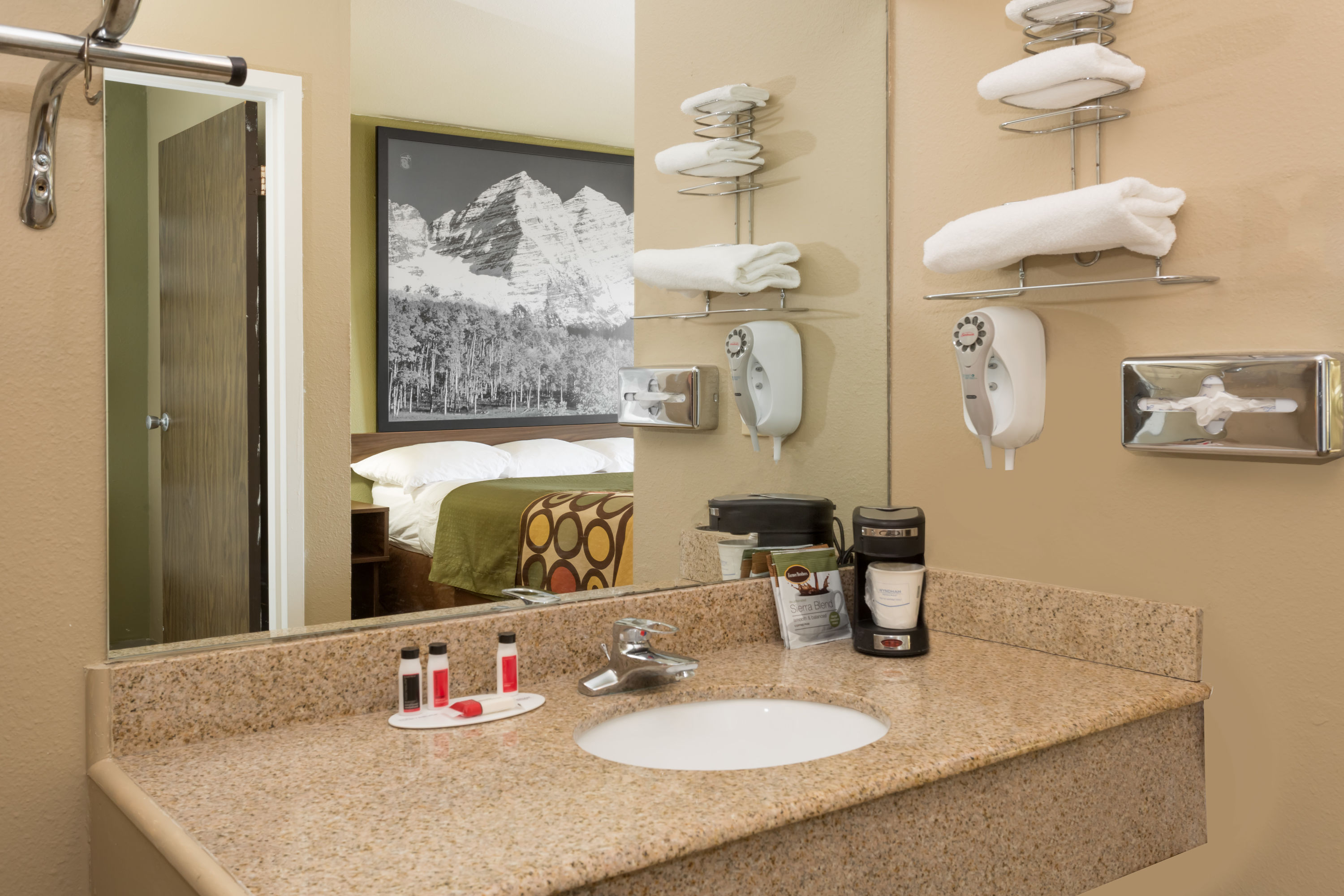 Guest room bath at the Super 8 by Wyndham Sterling CO in Sterling, Colorado
