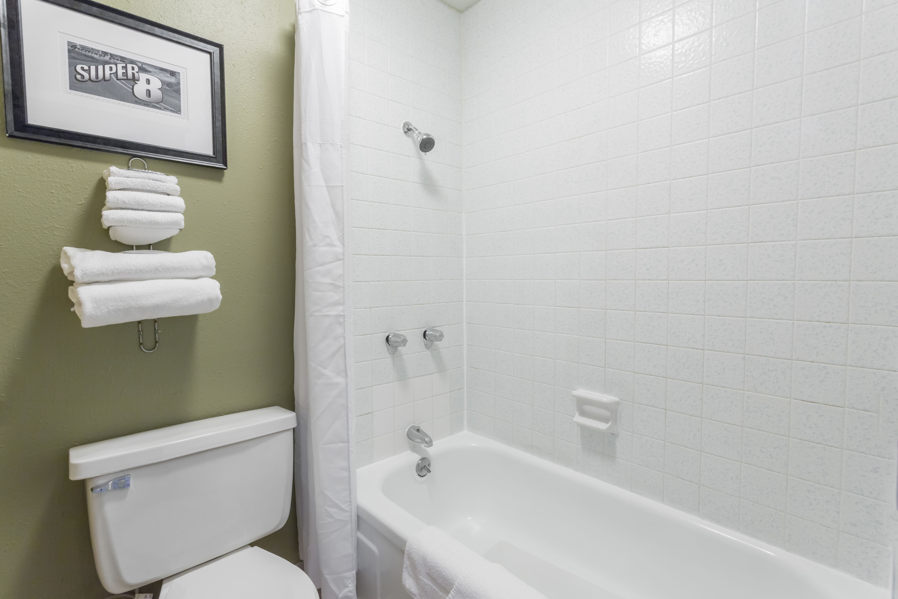 Guest room bath at the Super 8 by Wyndham Sterling CO in Sterling, Colorado