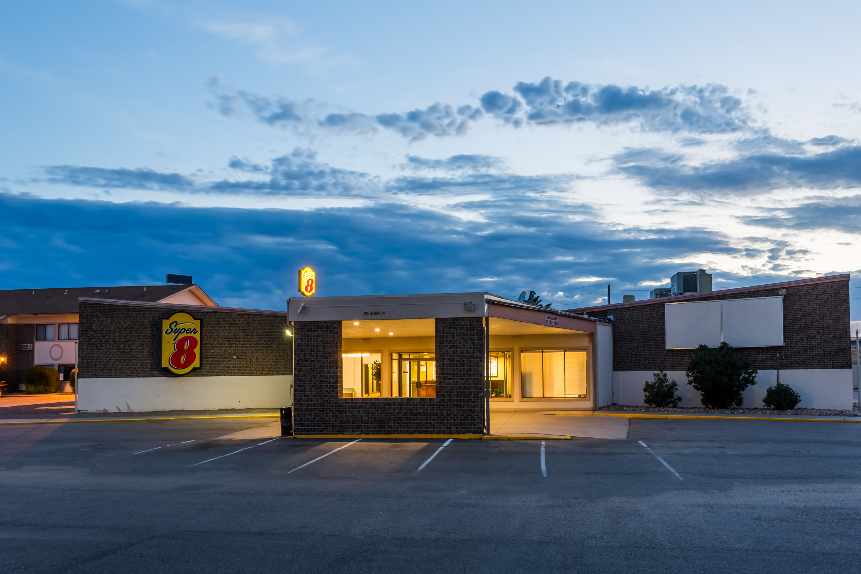 Exterior Dusk Image of Super 8 by Wyndham Sterling CO hotel in Sterling, Colorado