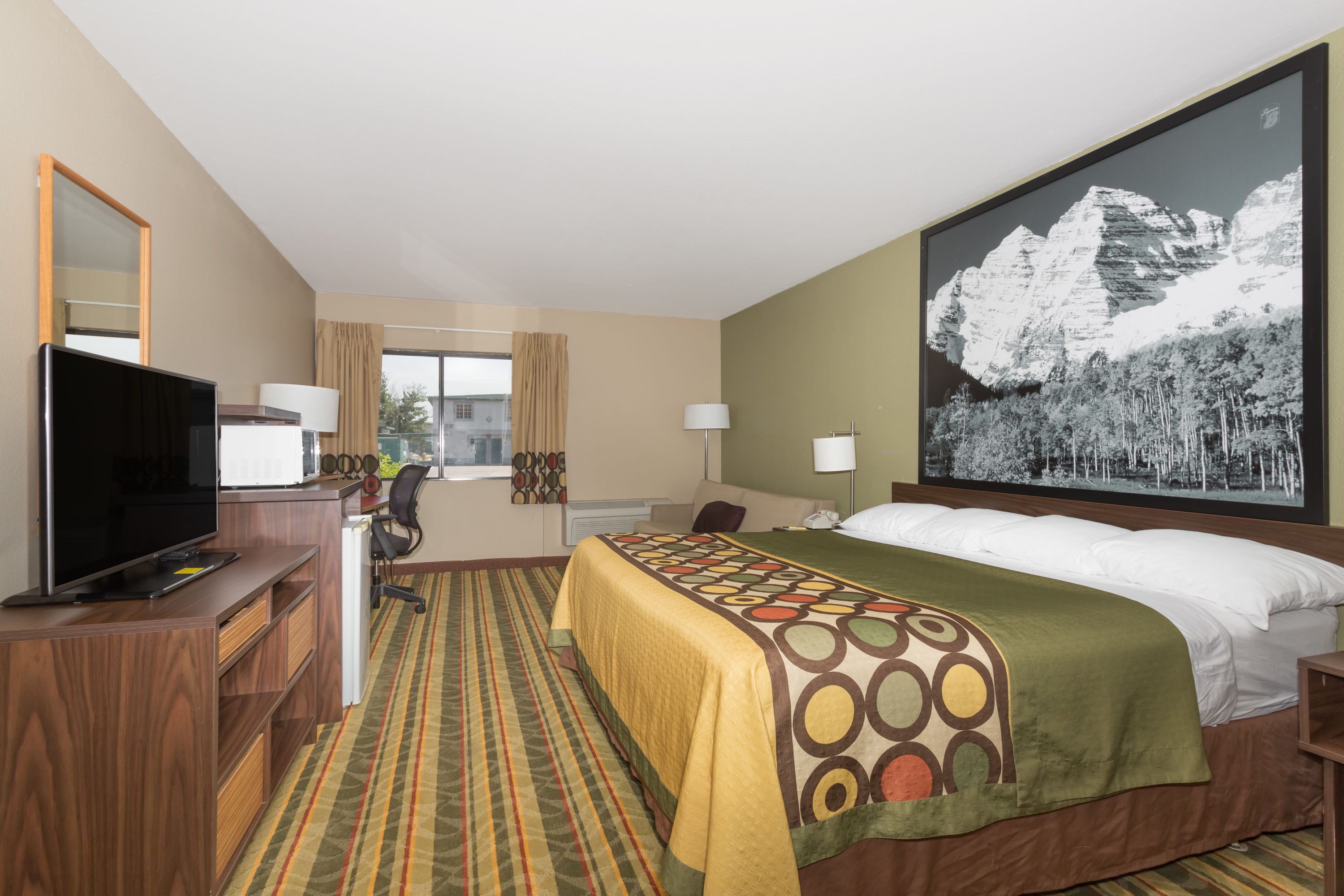 Guest room at the Super 8 by Wyndham Sterling CO in Sterling, Colorado