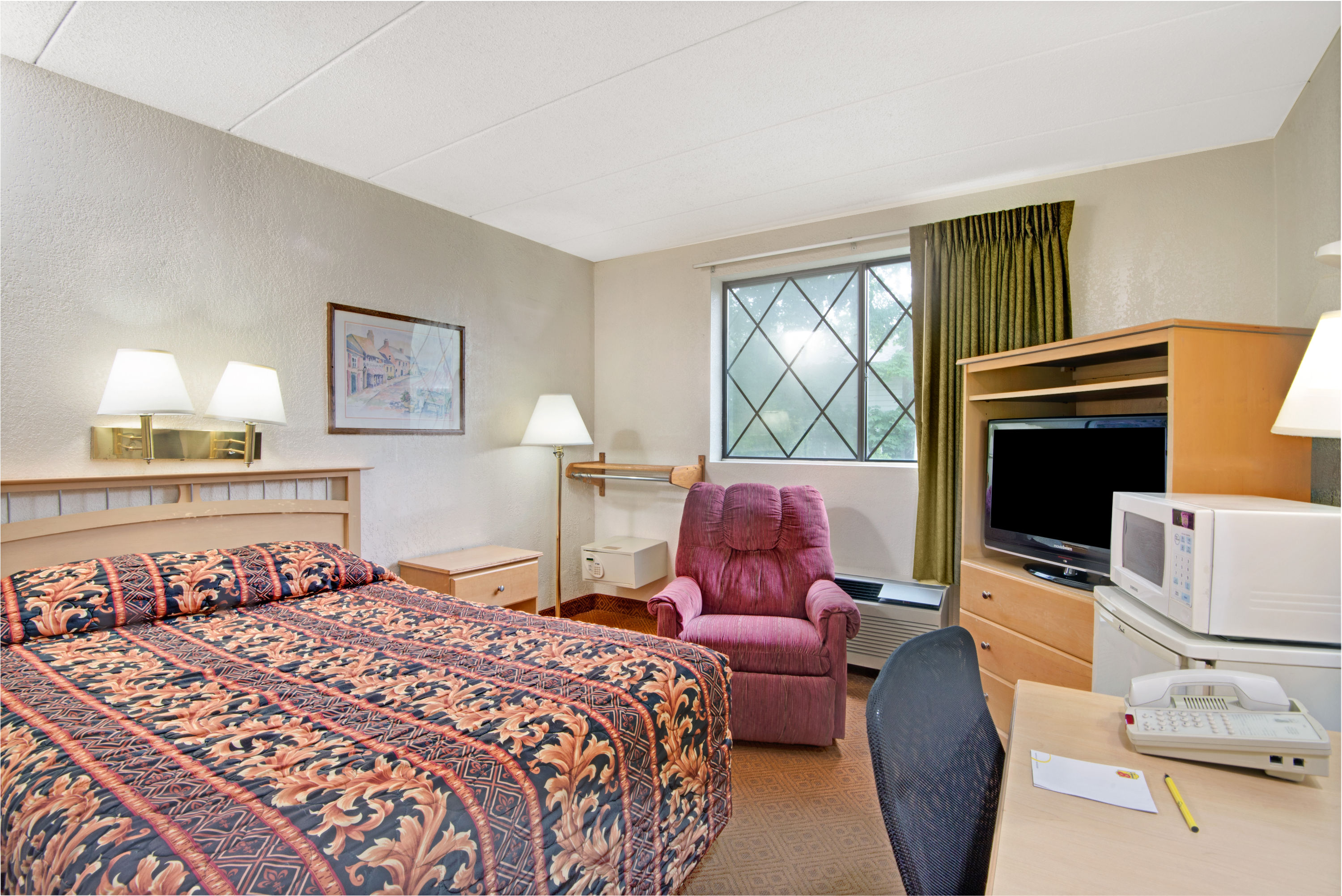 Guest room at the Super 8 by Wyndham Stamford/New York City Area in Stamford, Connecticut