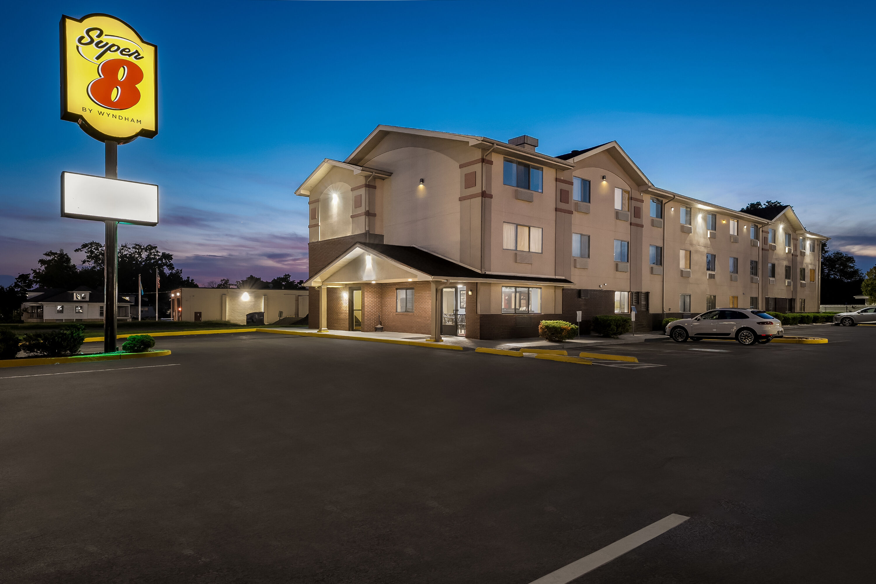 Exterior Night Image of Super 8 by Wyndham New Castle hotel in New Castle, Delaware