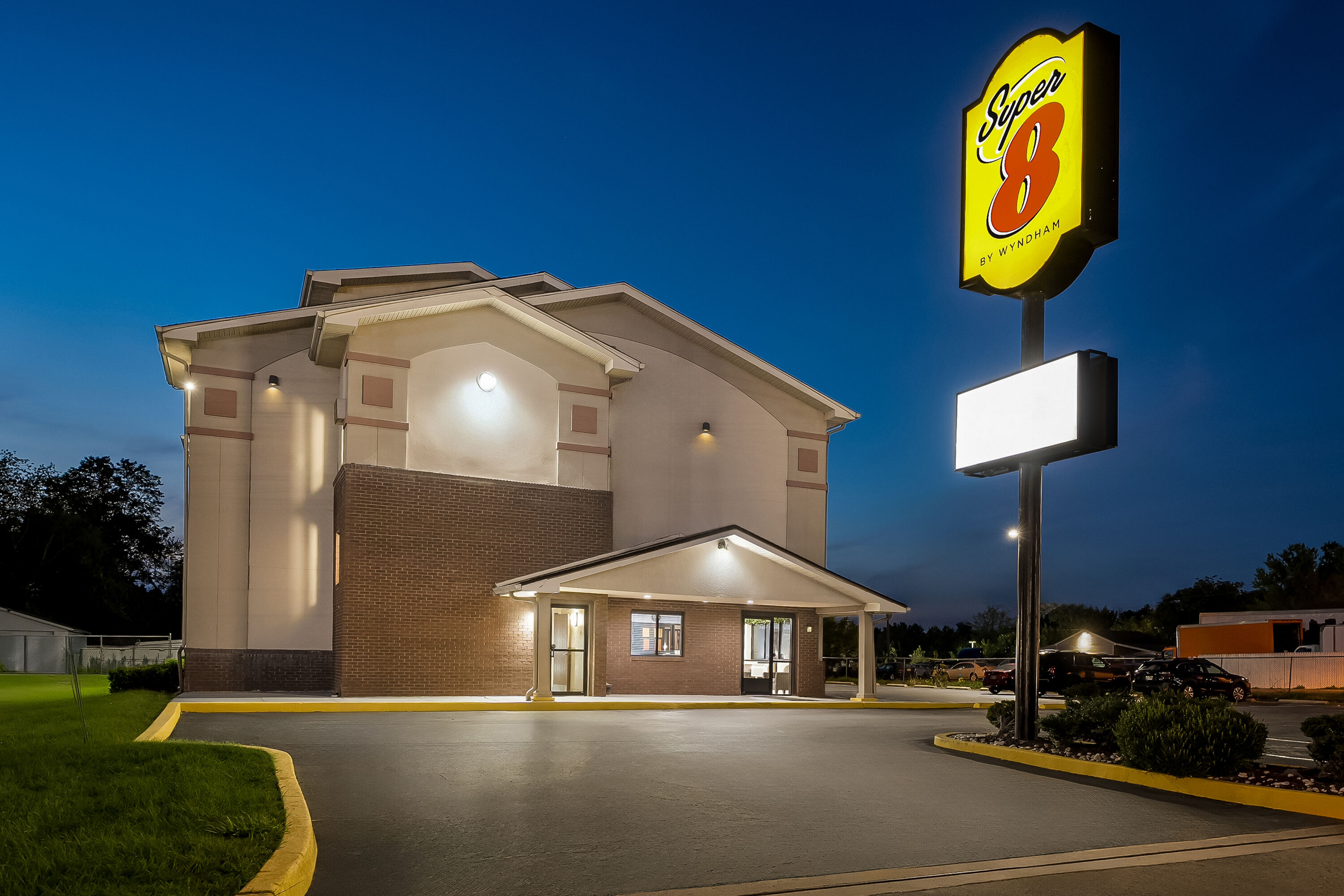 Exterior Night Image of Super 8 by Wyndham New Castle hotel in New Castle, Delaware