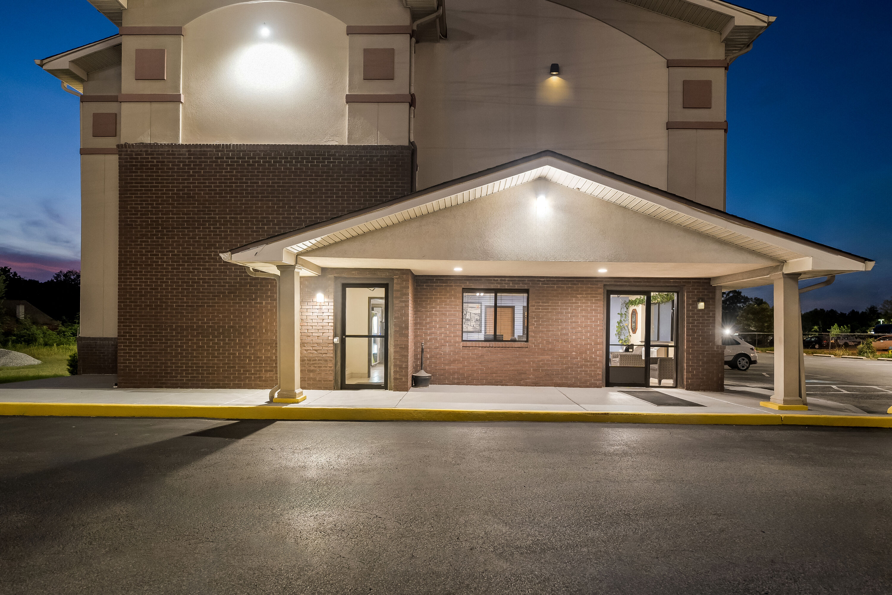 Exterior Night Image of Super 8 by Wyndham New Castle hotel in New Castle, Delaware