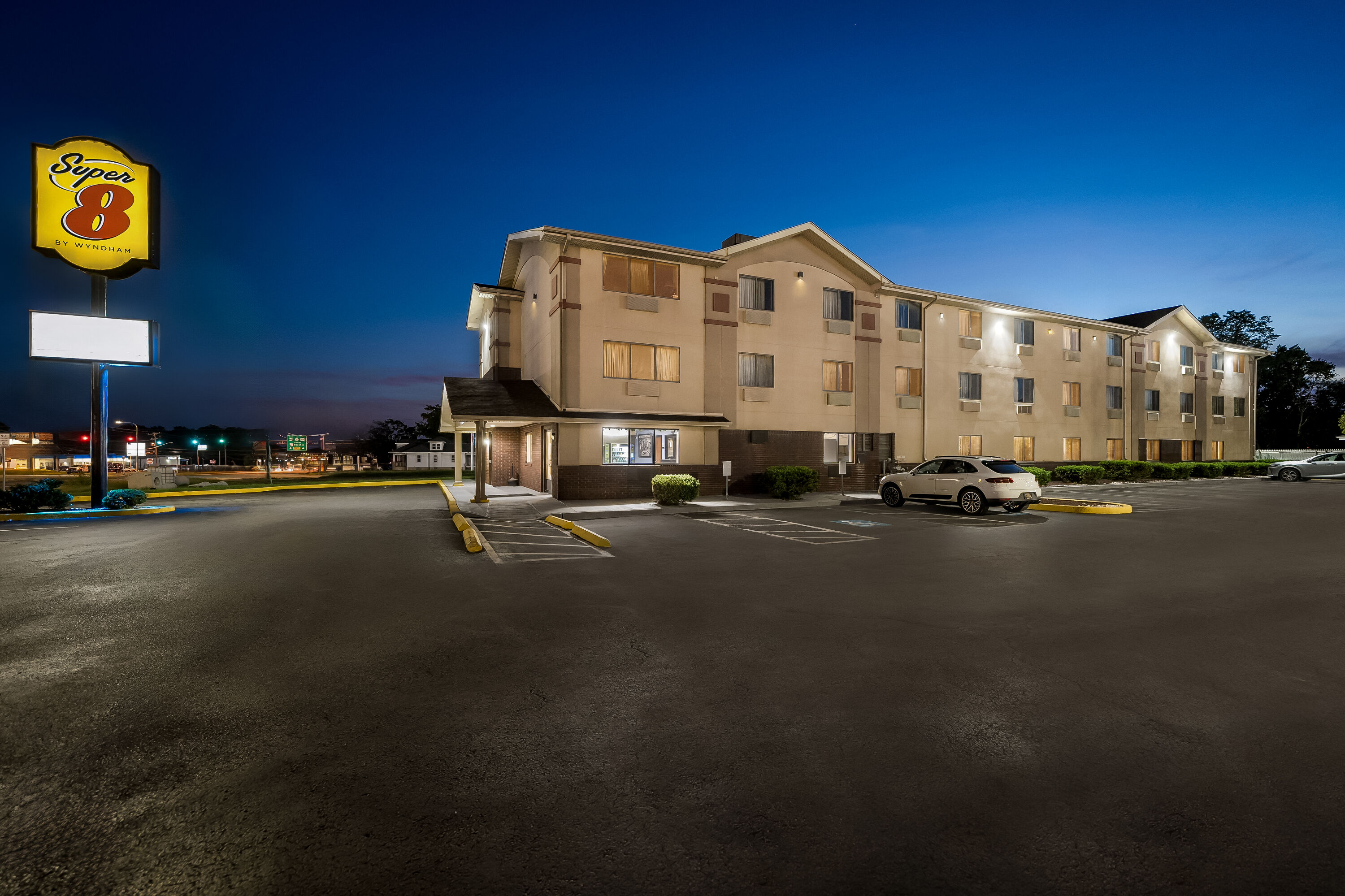 Exterior Night Image of Super 8 by Wyndham New Castle hotel in New Castle, Delaware