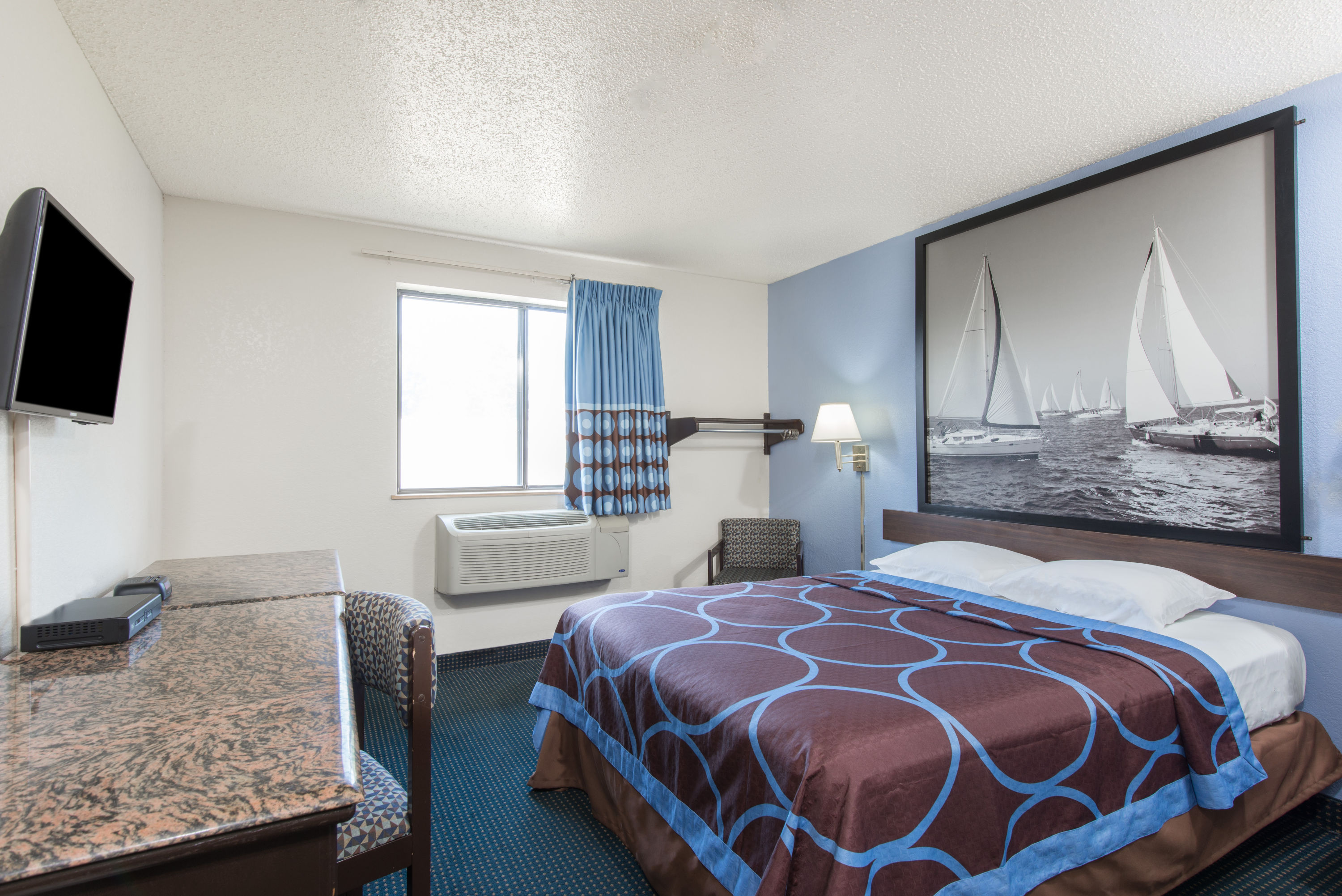Guest room at the Super 8 by Wyndham New Castle in New Castle, Delaware