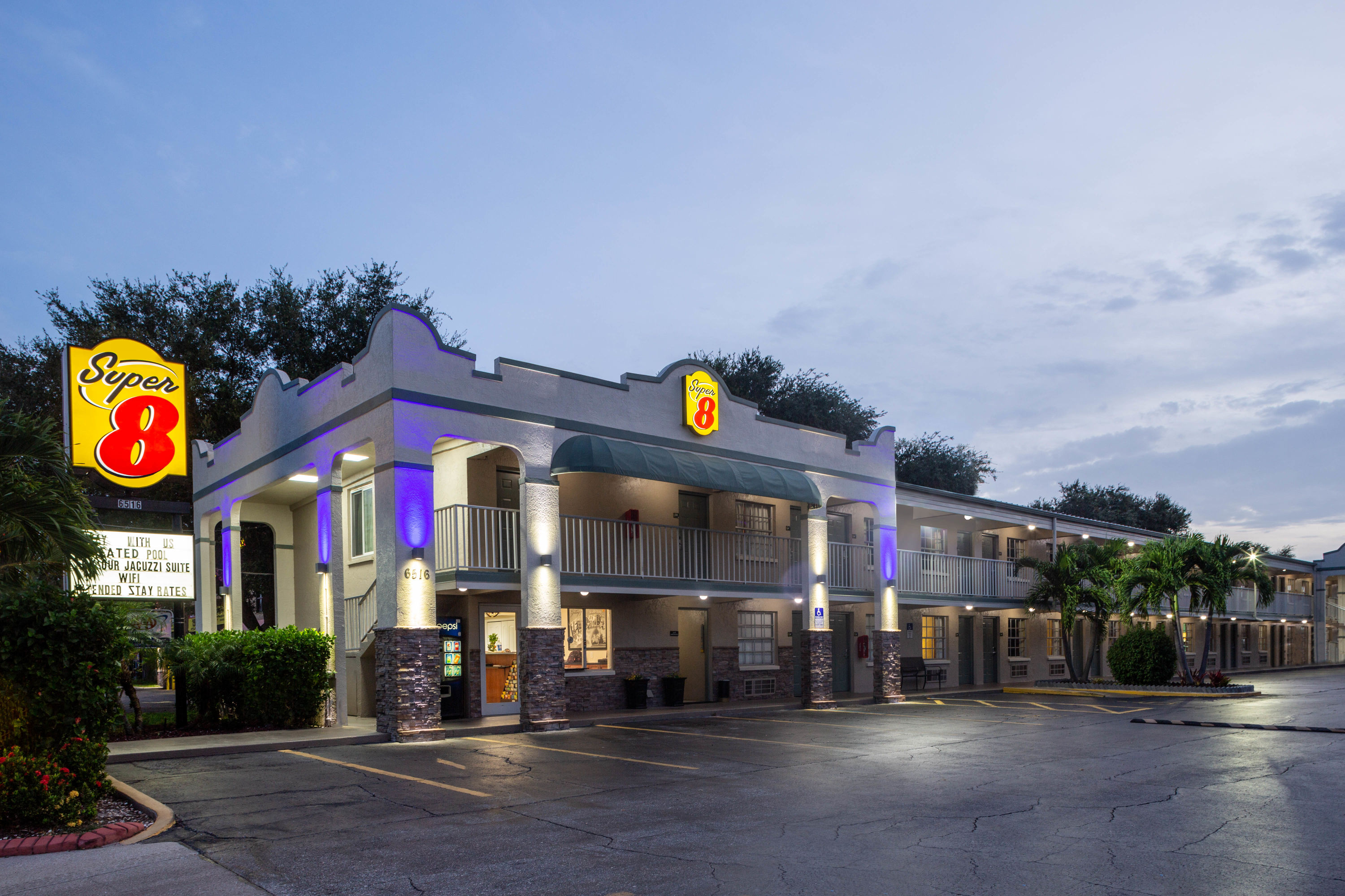 Exterior Dusk Image of Super 8 by Wyndham Bradenton Sarasota Area hotel in Bradenton, Florida