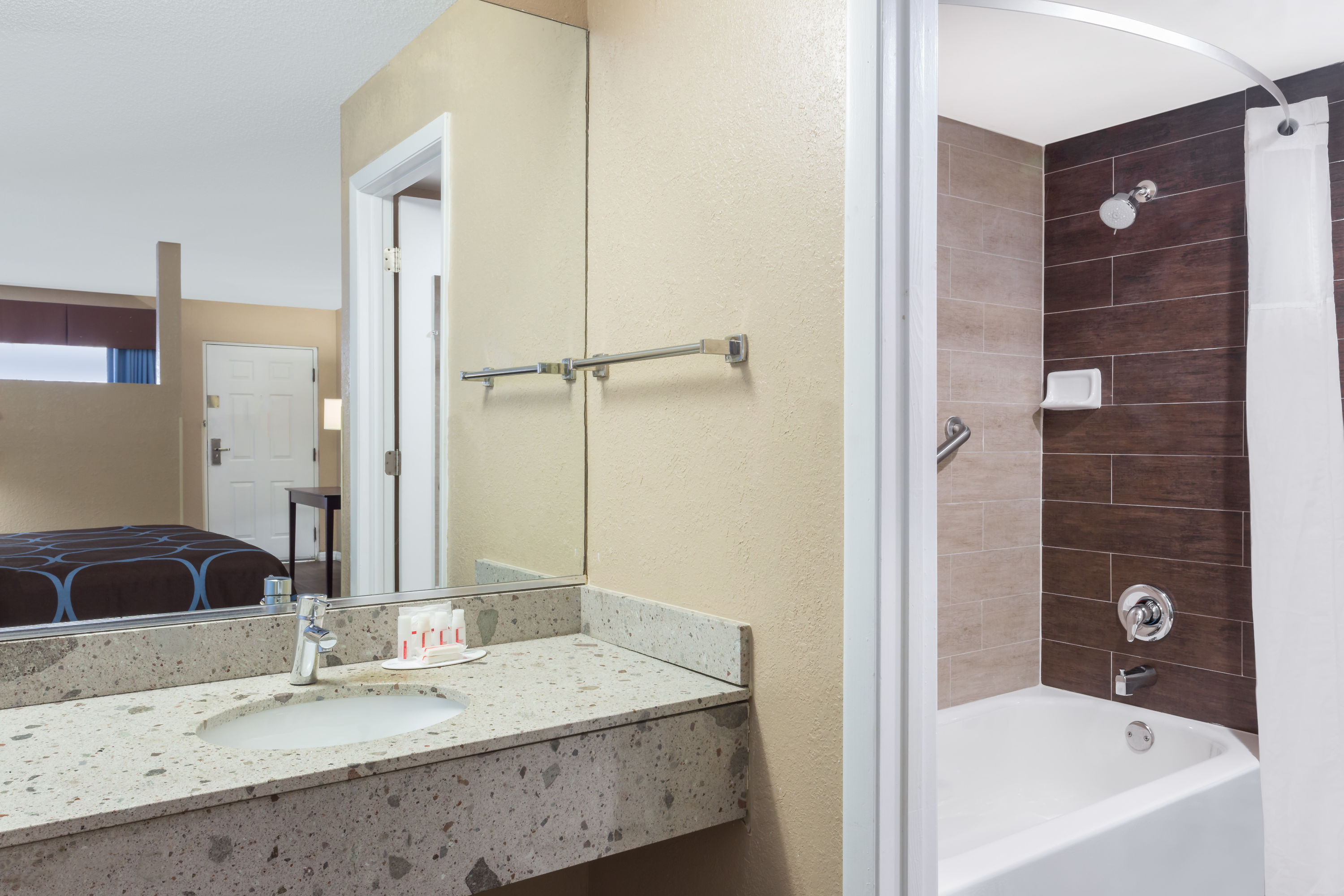 Guest room bath at the Super 8 by Wyndham Ellenton Bradenton Area in Ellenton, Florida