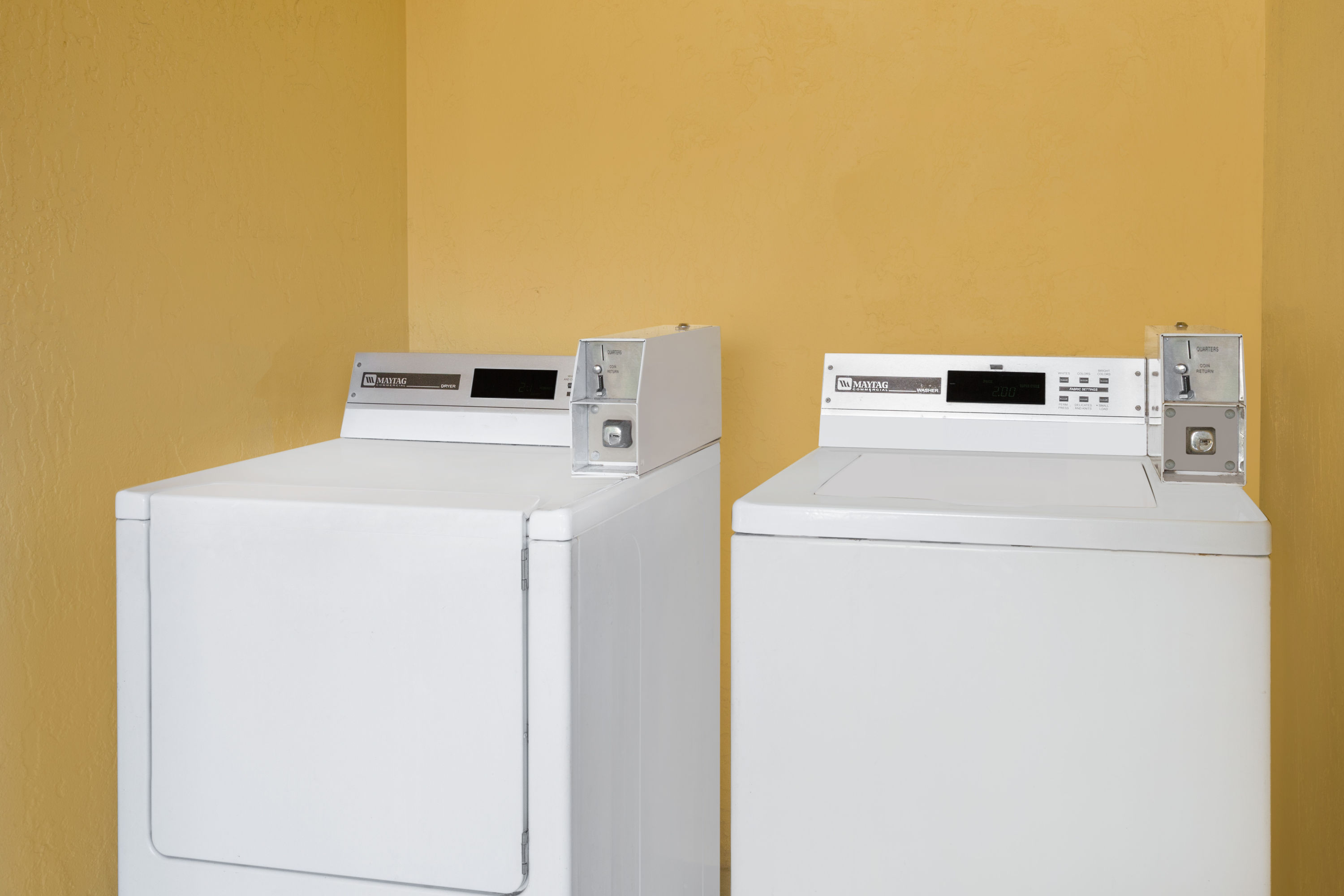 Laundry facilities at Super 8 by Wyndham Ellenton Bradenton Area in Ellenton, Florida