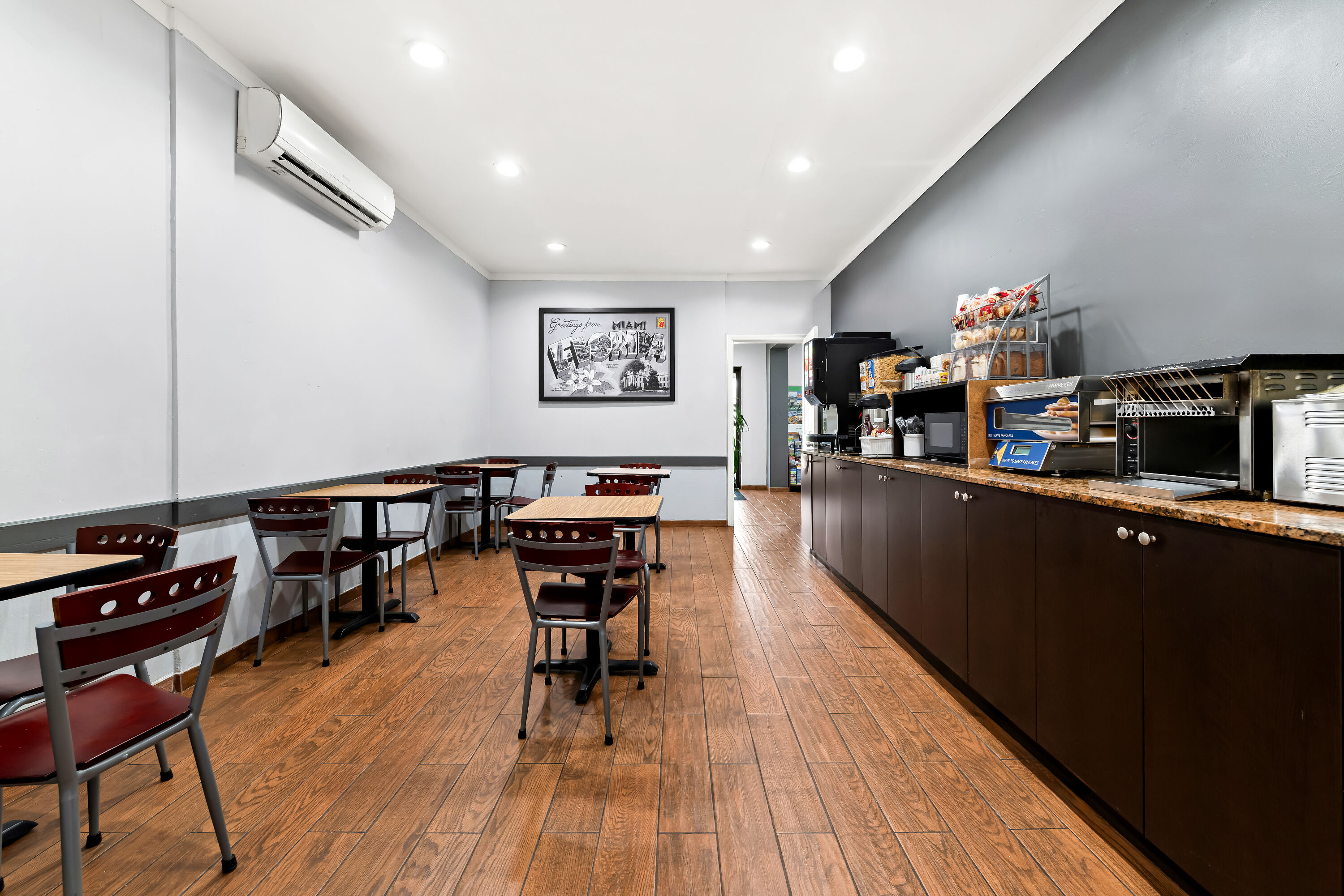 Super 8 by Wyndham Florida City/Gateway to Keys/Everglades restaurant breakfast area with seating in Florida City, Florida