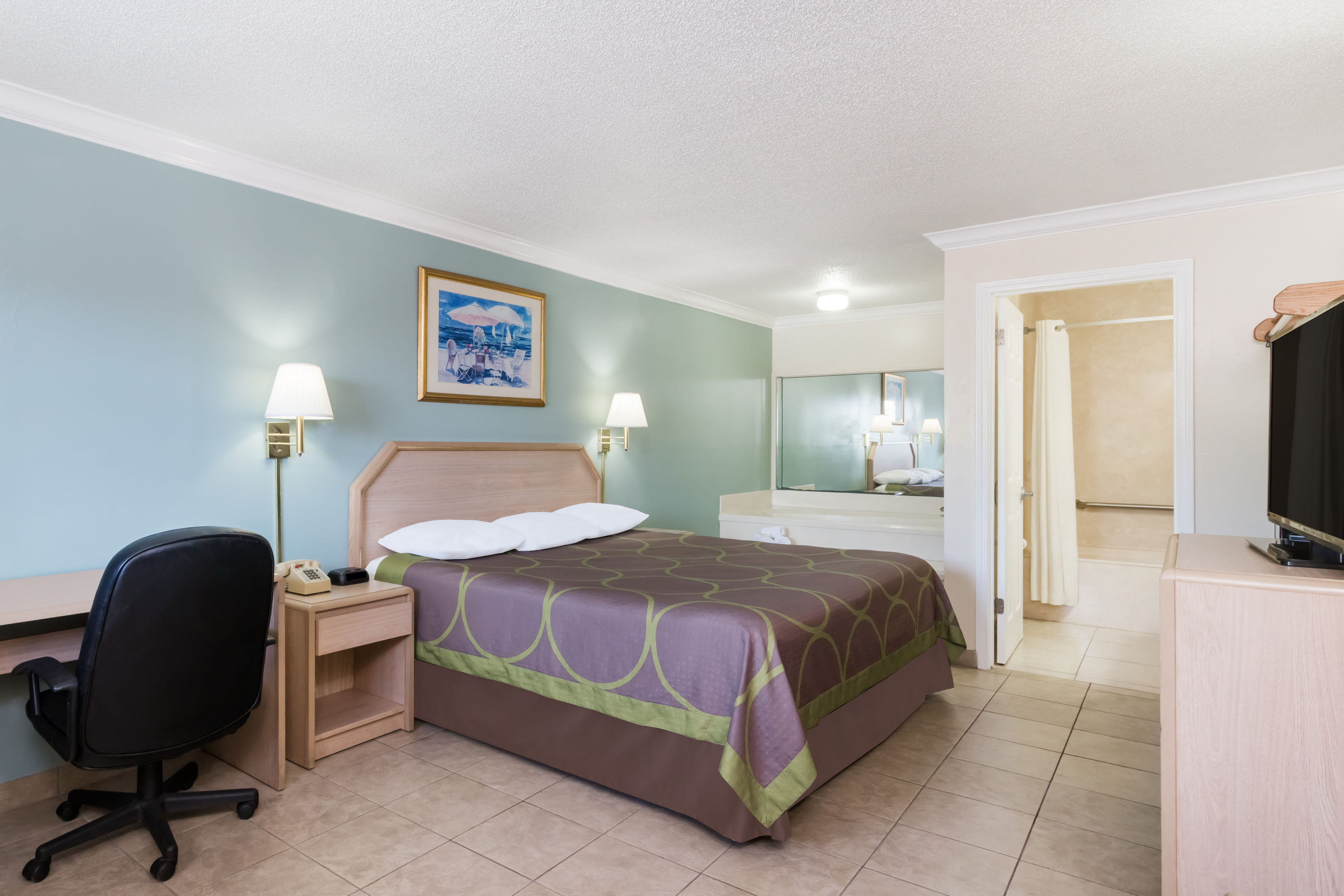 Guest room at the Super 8 by Wyndham Ft Walton Beach in Fort Walton Beach, Florida