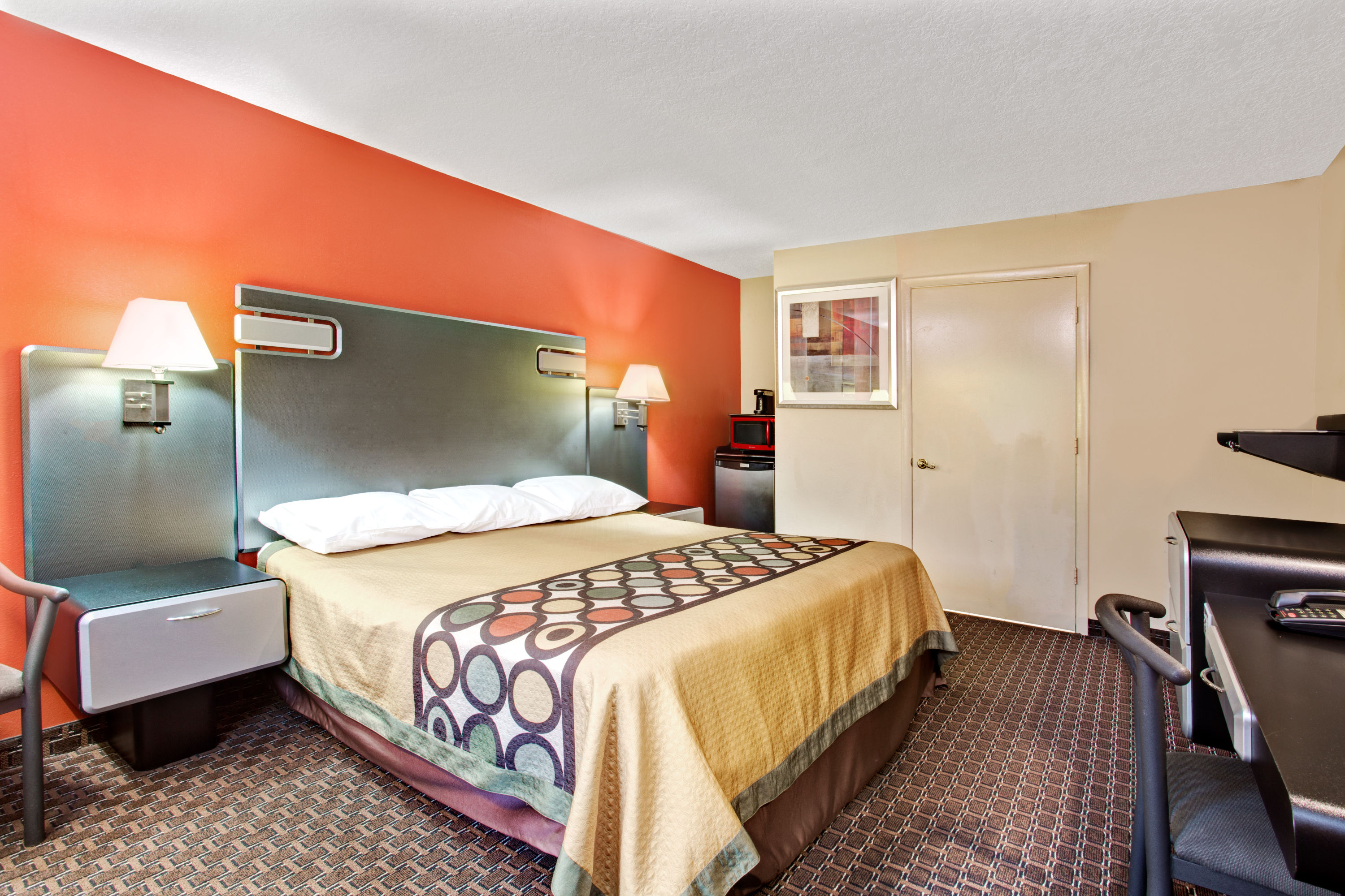 Guest room at the Super 8 by Wyndham Kissimmee/Maingate/Orlando Area in Kissimmee, Florida