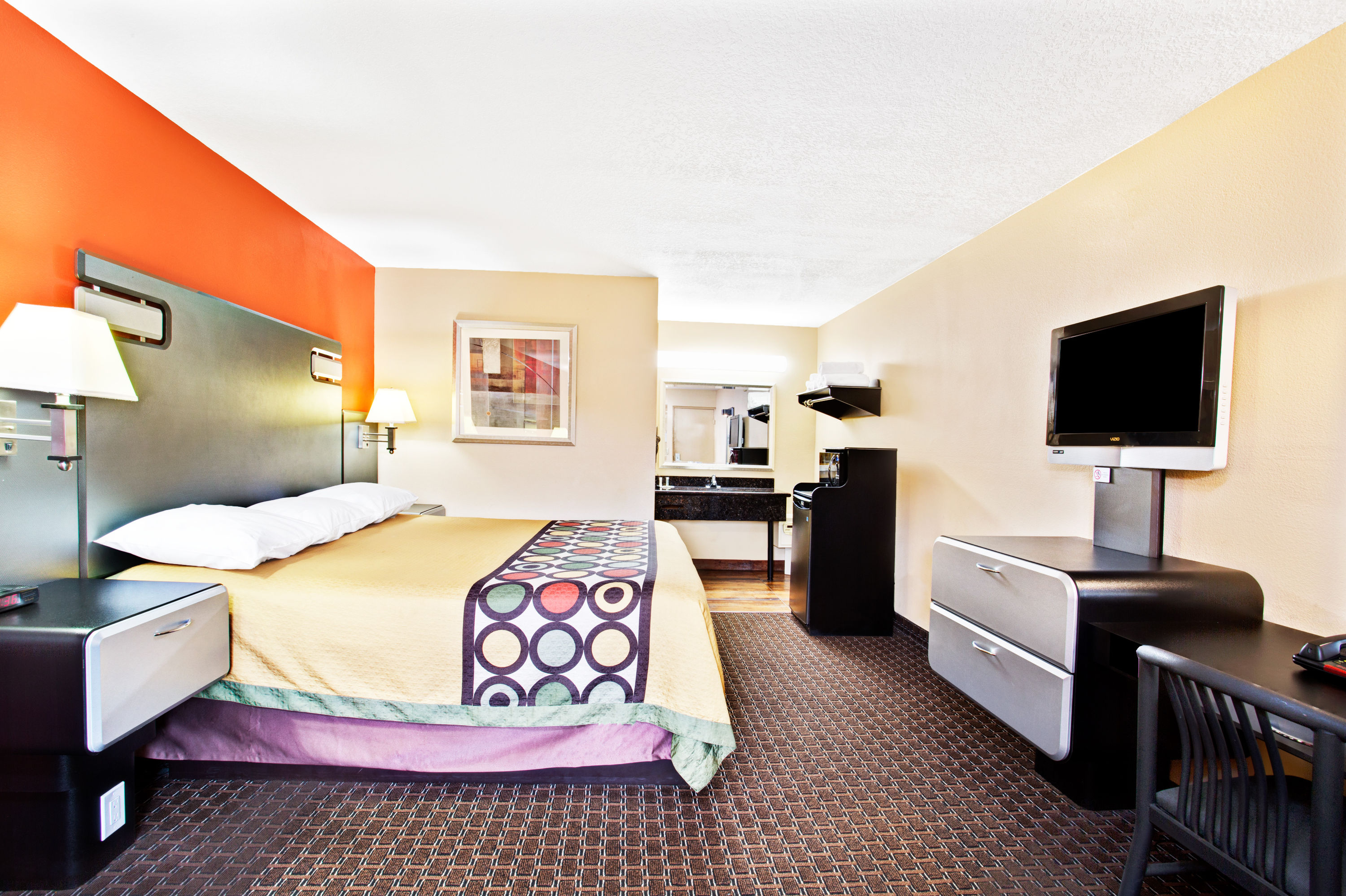 Guest room at the Super 8 by Wyndham Kissimmee/Maingate/Orlando Area in Kissimmee, Florida