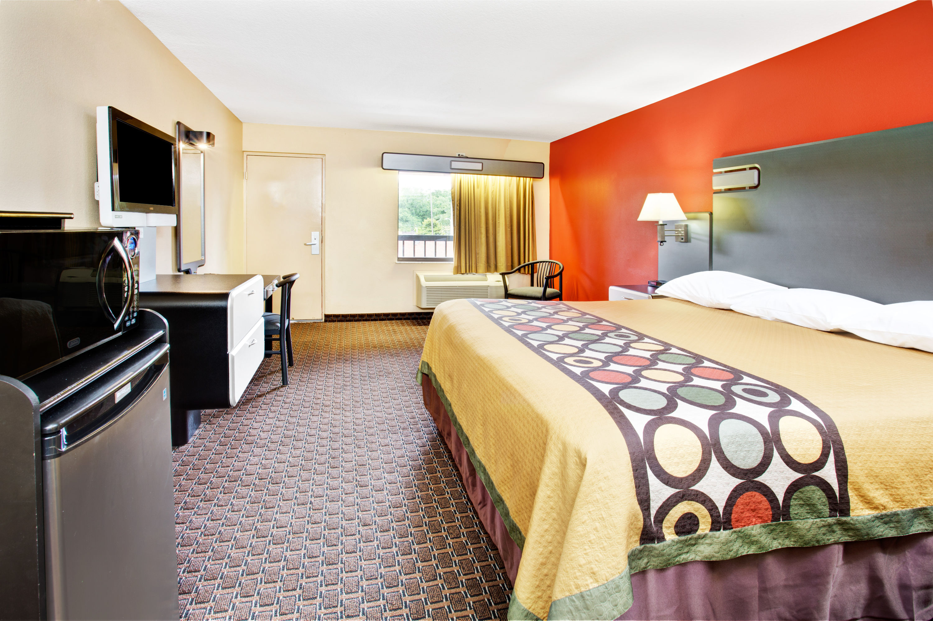 Guest room at the Super 8 by Wyndham Kissimmee/Maingate/Orlando Area in Kissimmee, Florida