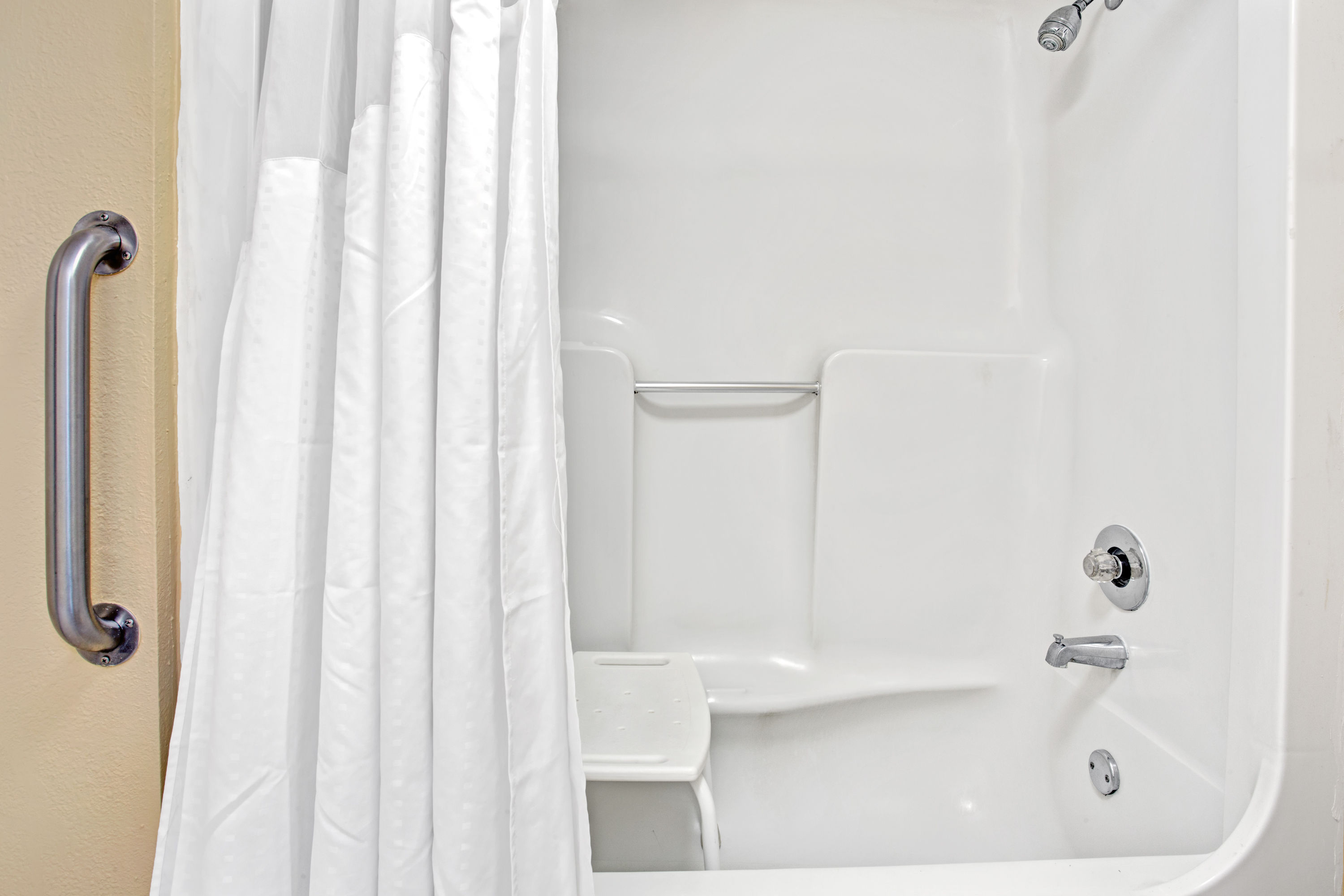 Guest room at the Super 8 by Wyndham Kissimmee/Maingate/Orlando Area in Kissimmee, Florida