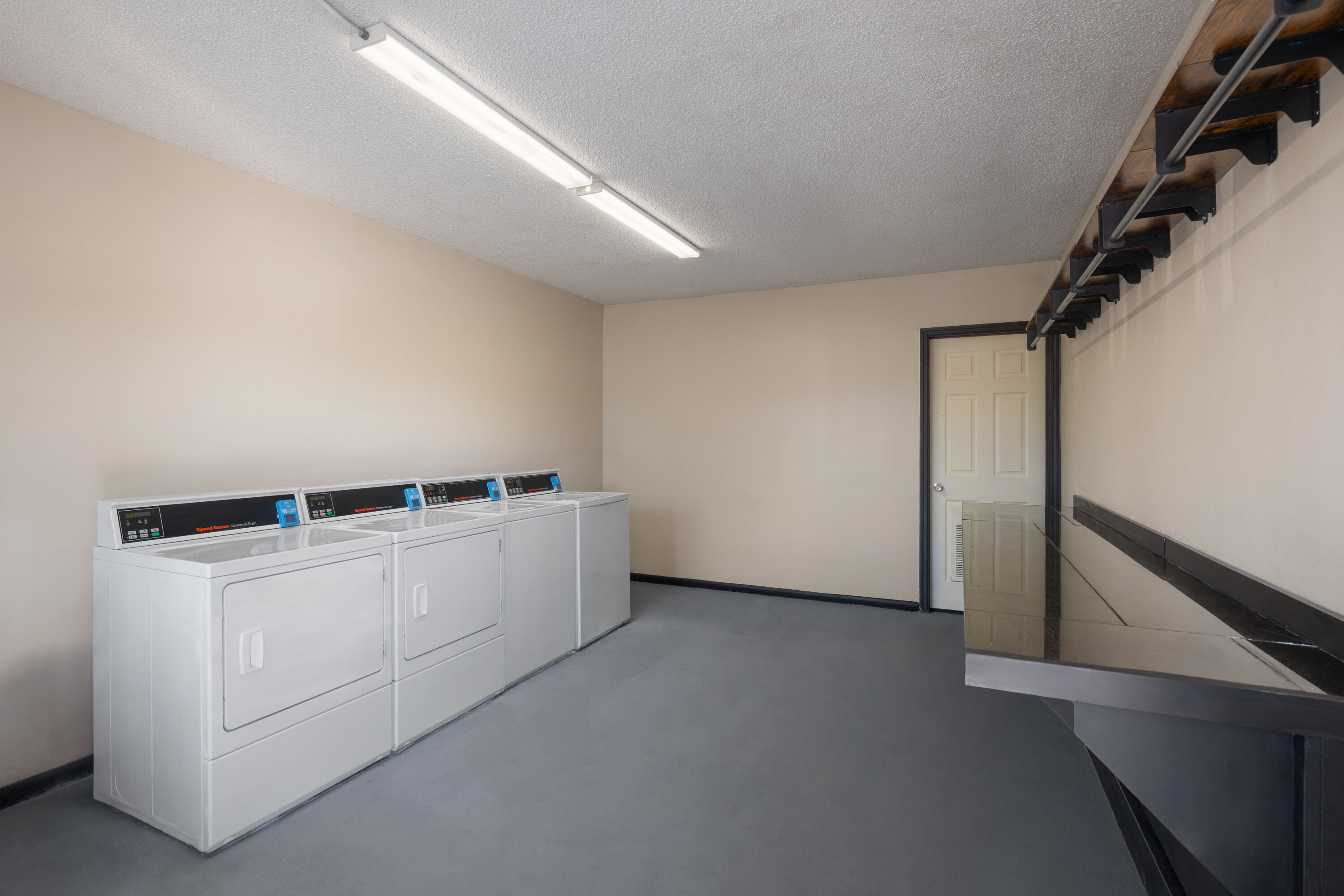 Laundry facilities at Super 8 by Wyndham Lake City in Lake City, Florida
