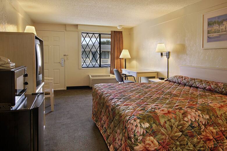 Guest room at the Super 8 Lantana West Palm Beach in Lantana, Florida