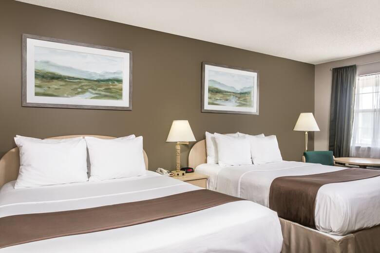 Guest room at the Super 8 Madison in Madison, Florida