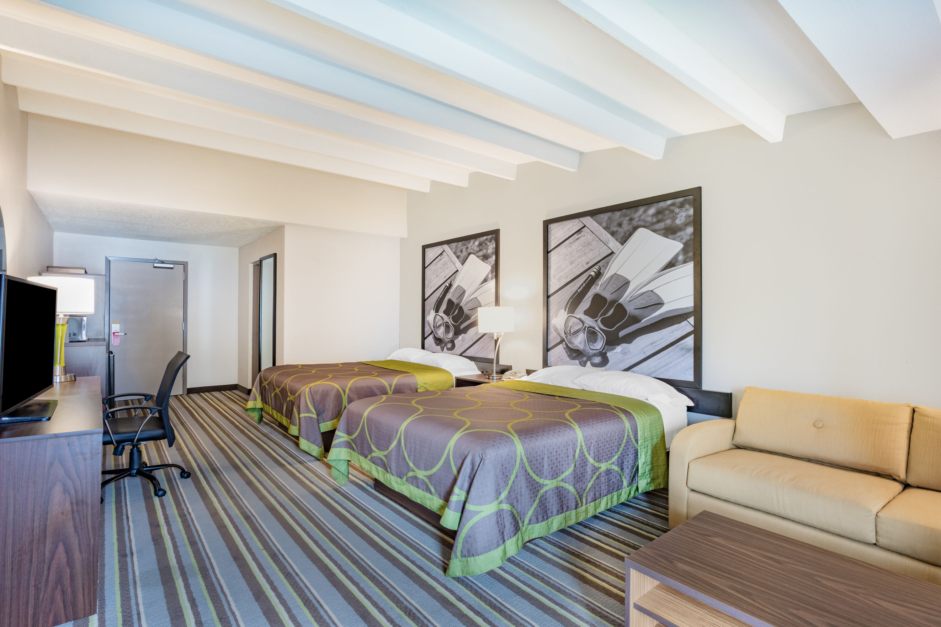 Guest room at the Super 8 by Wyndham Melbourne in Melbourne, Florida