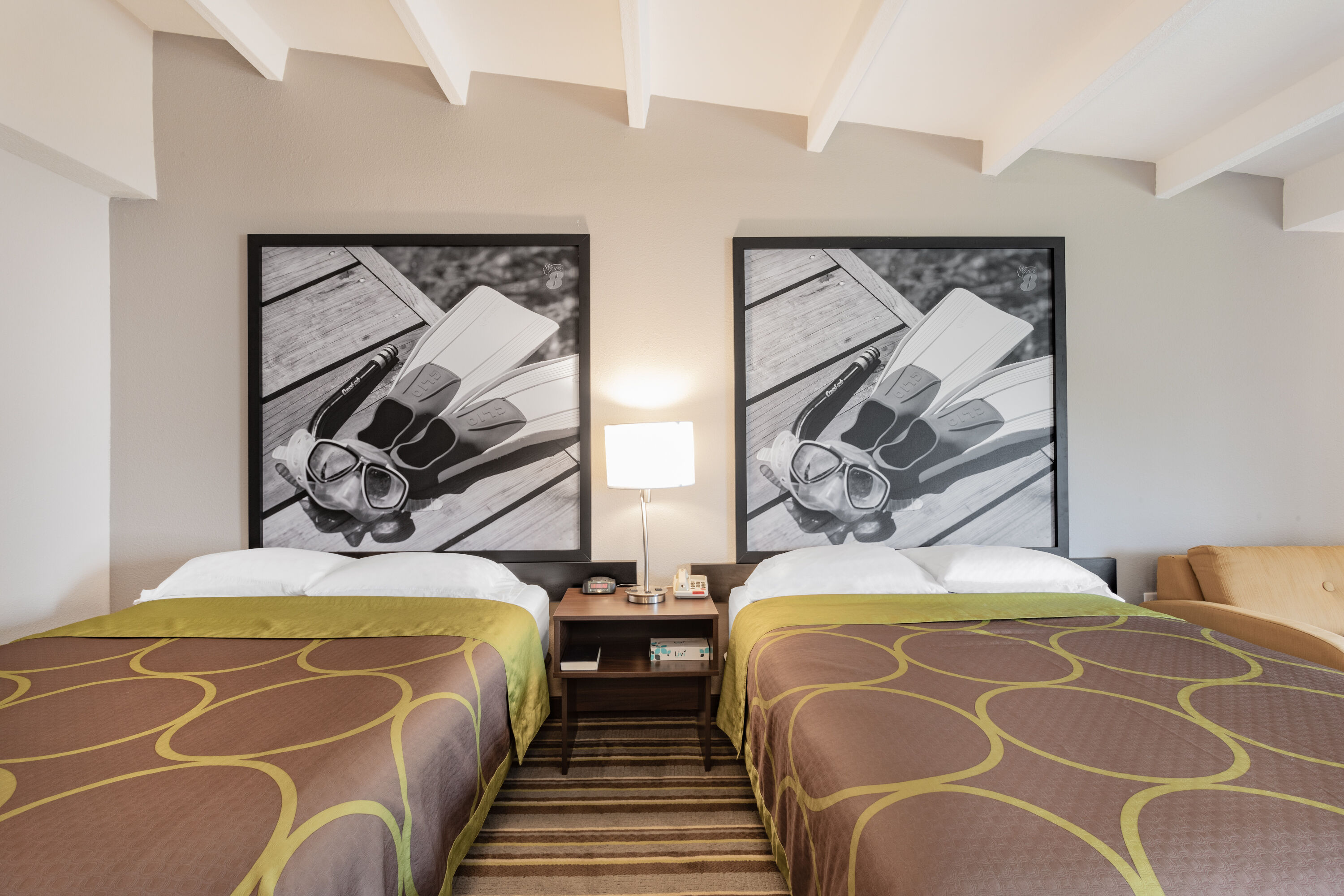 Guest room at the Super 8 by Wyndham Melbourne in Melbourne, Florida