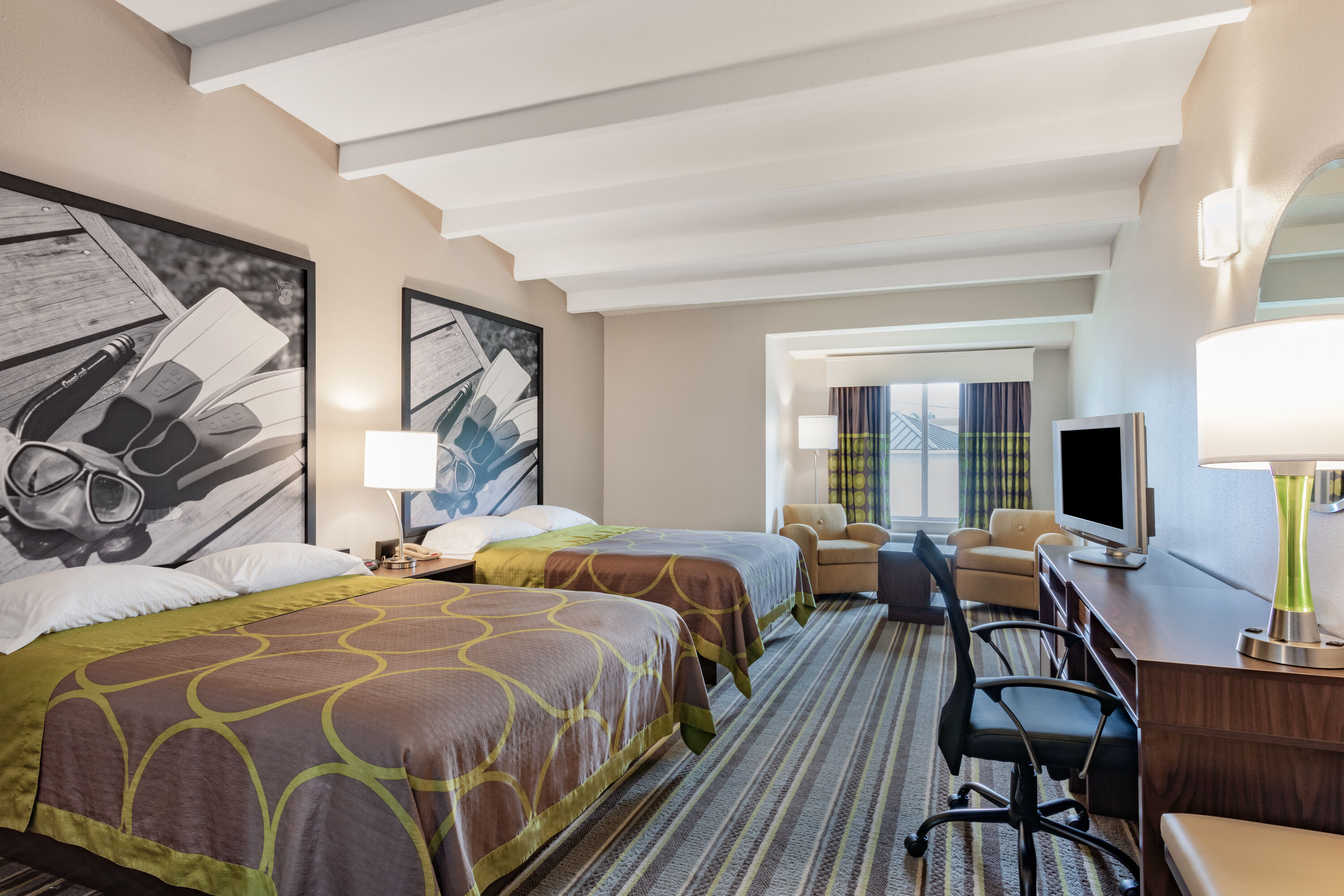 Guest room at the Super 8 by Wyndham Melbourne in Melbourne, Florida