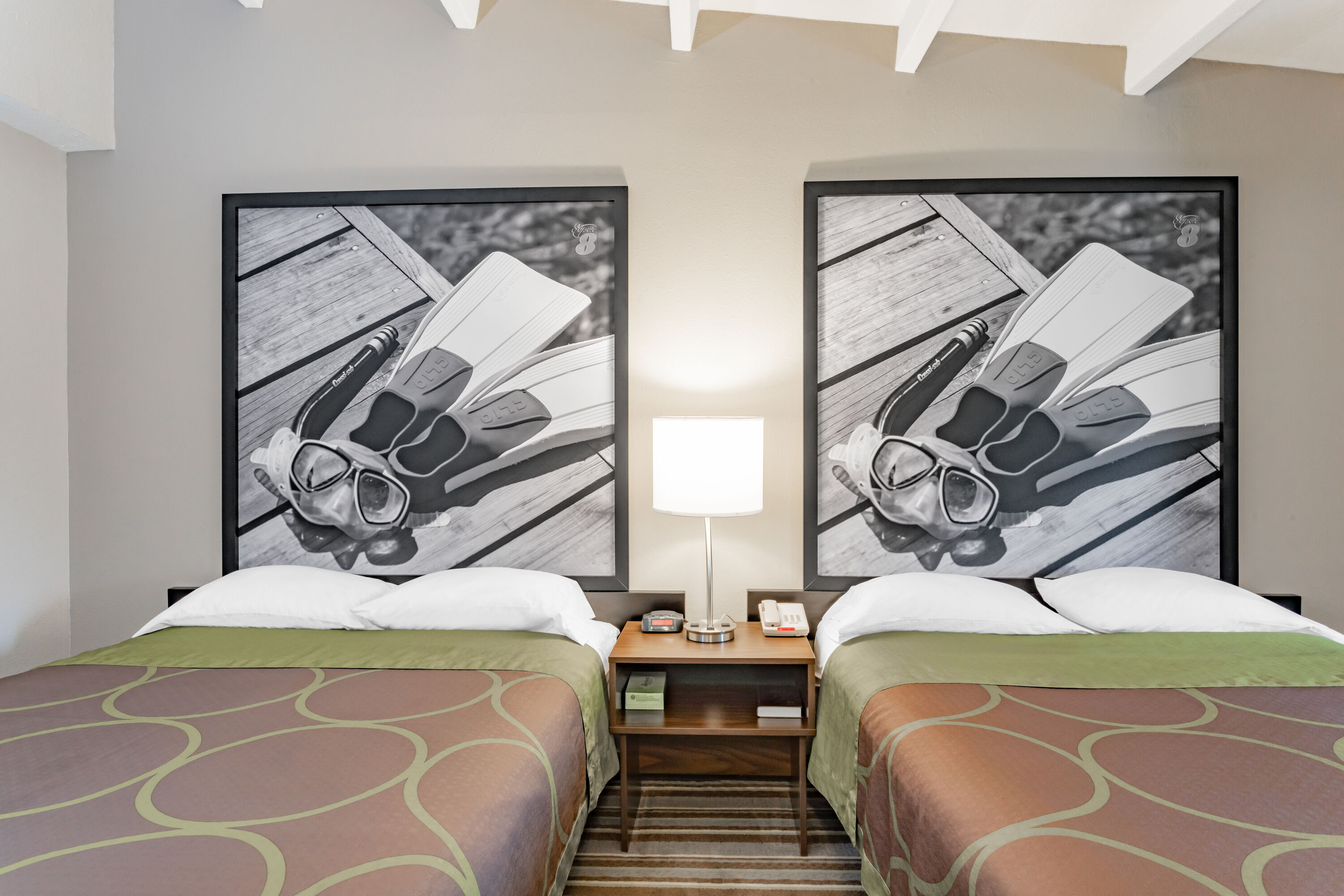 Guest room at the Super 8 by Wyndham Melbourne in Melbourne, Florida