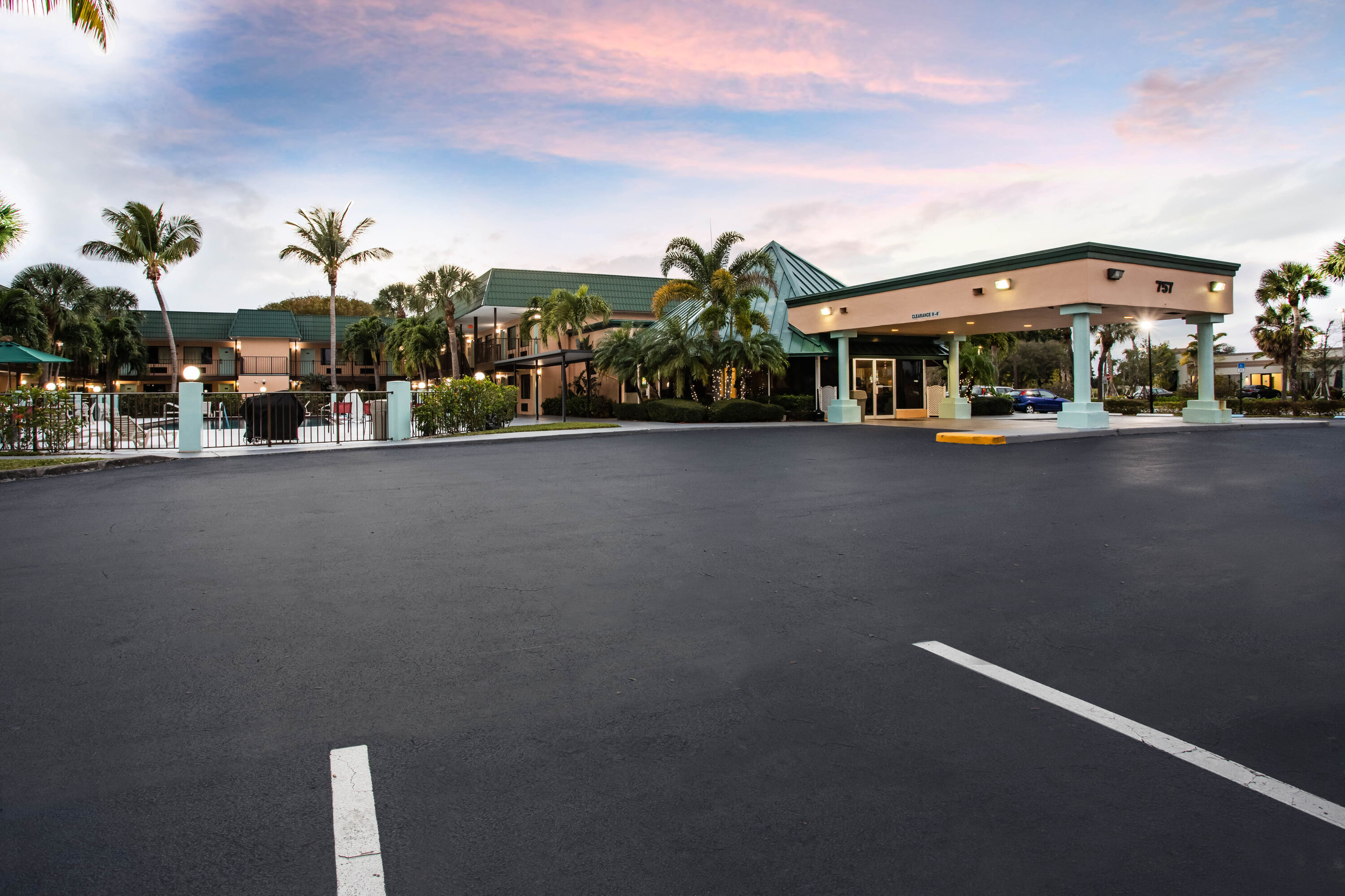 Exterior Dusk Image of Super 8 by Wyndham North Palm Beach hotel in North Palm Beach, Florida