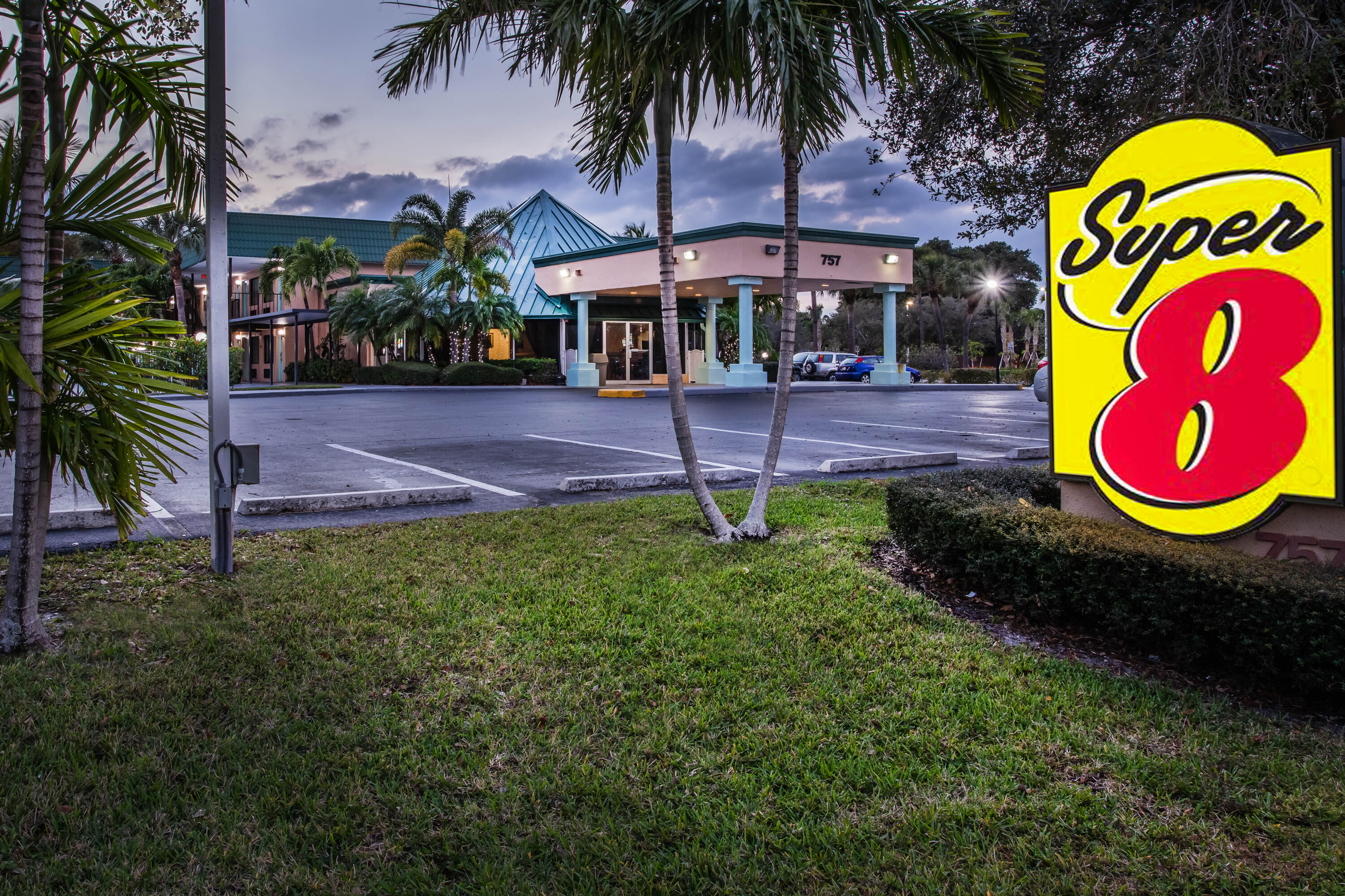 Exterior Dusk Image of Super 8 by Wyndham North Palm Beach hotel in North Palm Beach, Florida