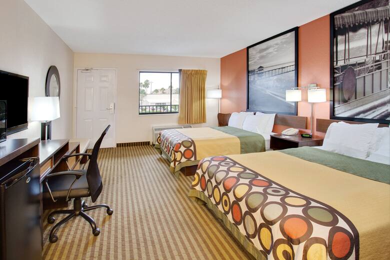 Guest room at the Super 8 Orlando International Drive in Orlando, Florida