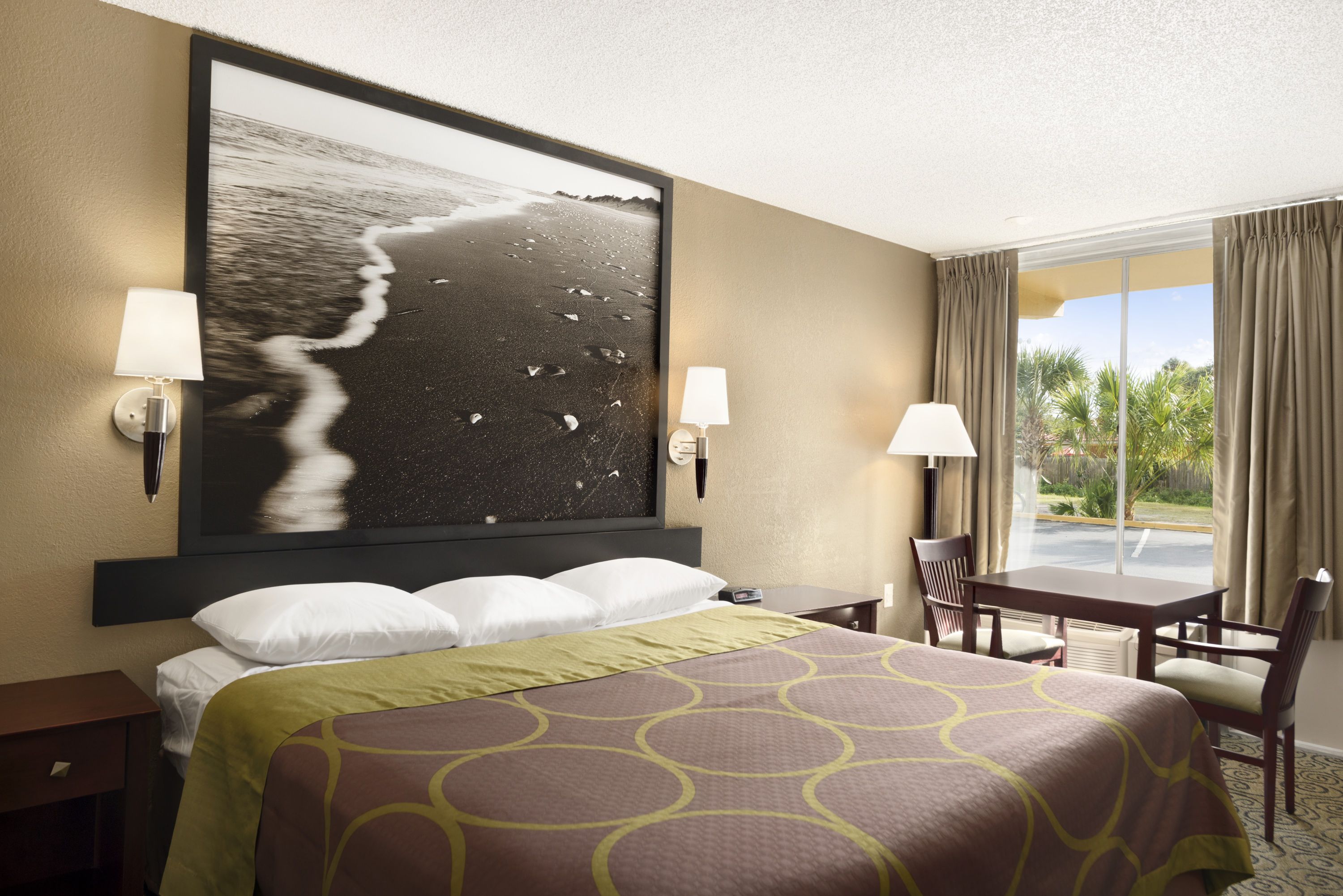 Guest room at the Super 8 by Wyndham Ormond Beach in Ormond Beach, Florida