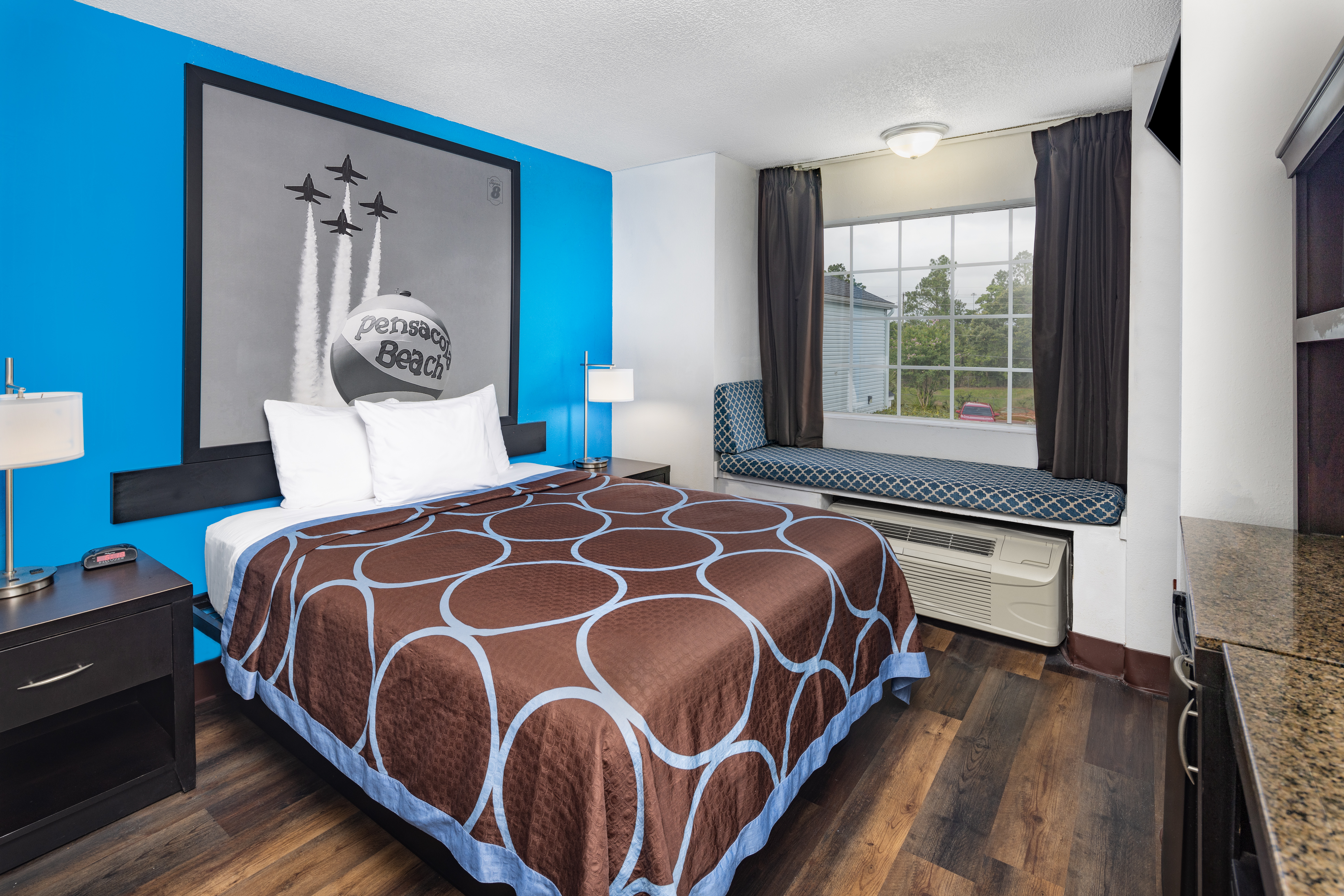 Guest room at the Super 8 by Wyndham Pensacola in Pensacola, Florida