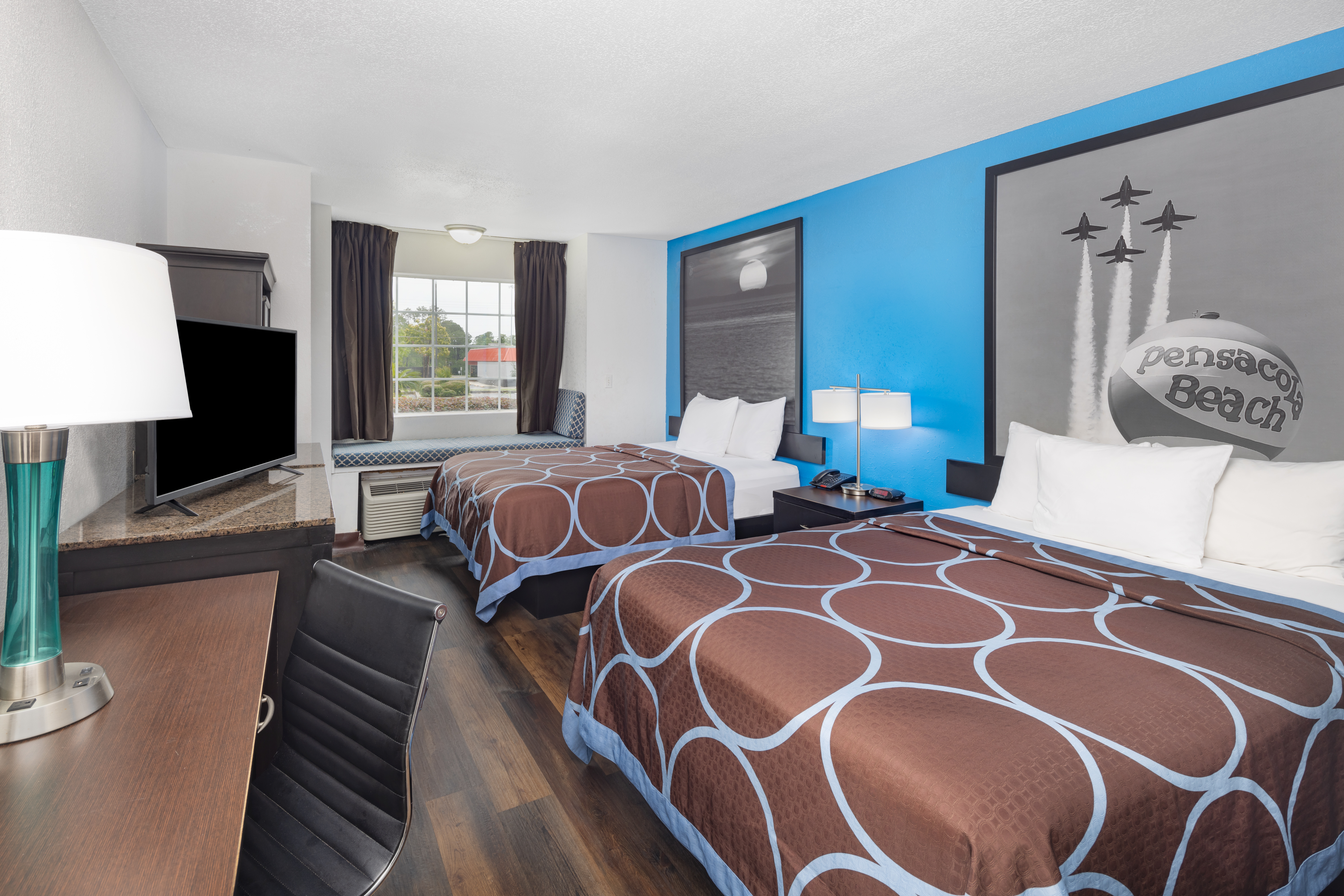 Guest room at the Super 8 by Wyndham Pensacola in Pensacola, Florida