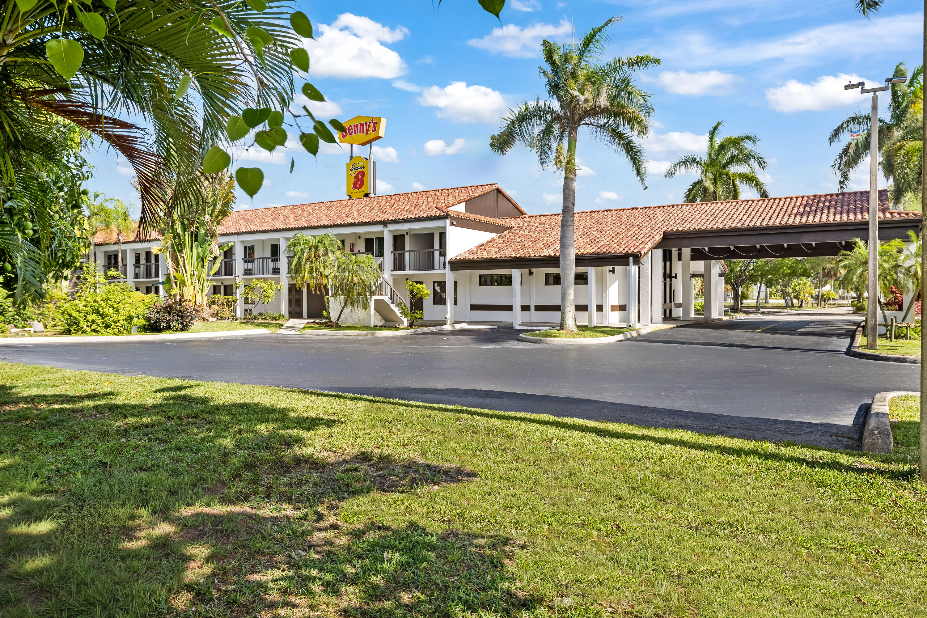 Exterior Day Image of Super 8 by Wyndham Riviera Beach West Palm Beach hotel in Riviera Beach, Florida