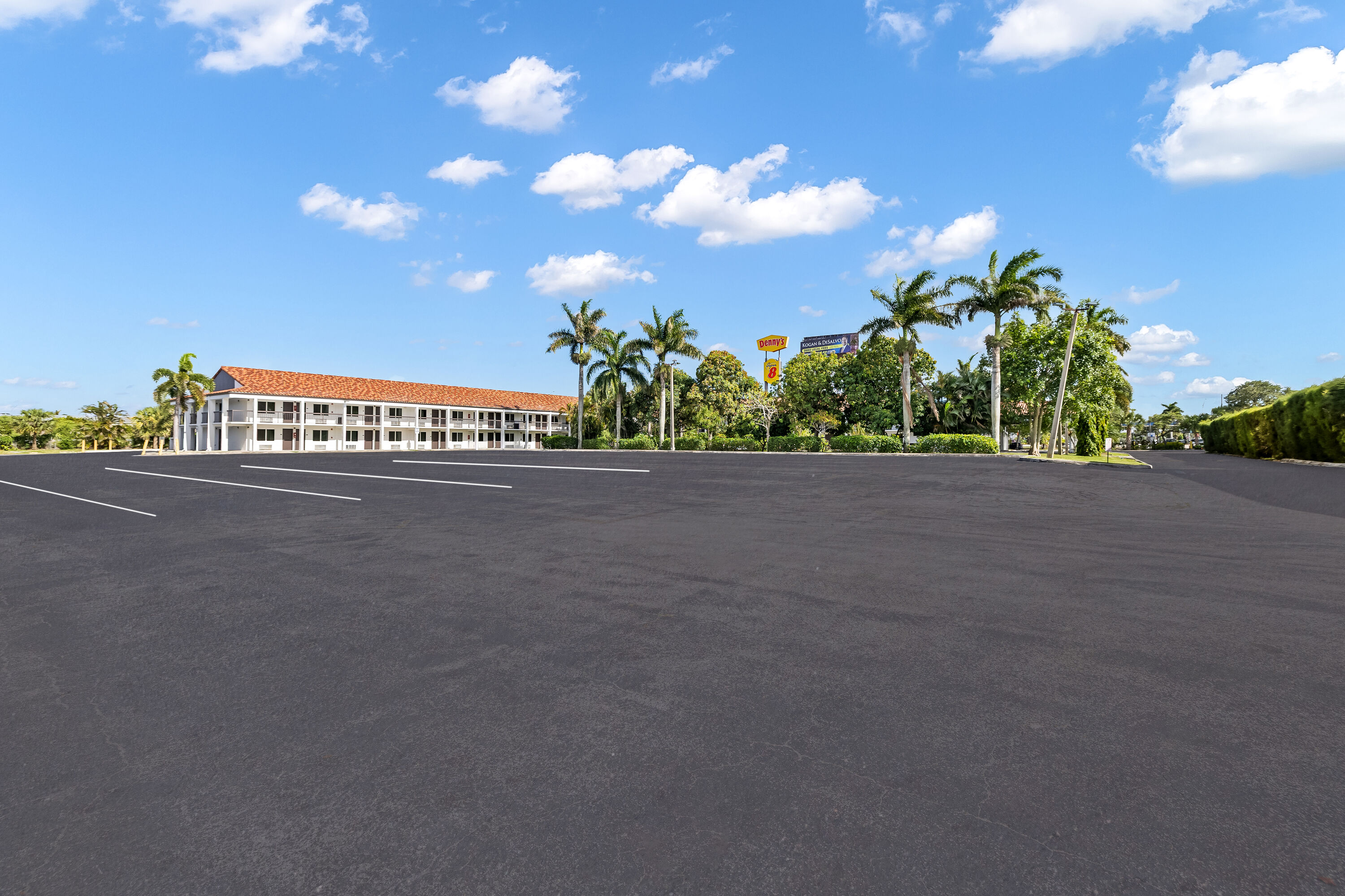 Exterior Day Image of Super 8 by Wyndham Riviera Beach West Palm Beach hotel in Riviera Beach, Florida