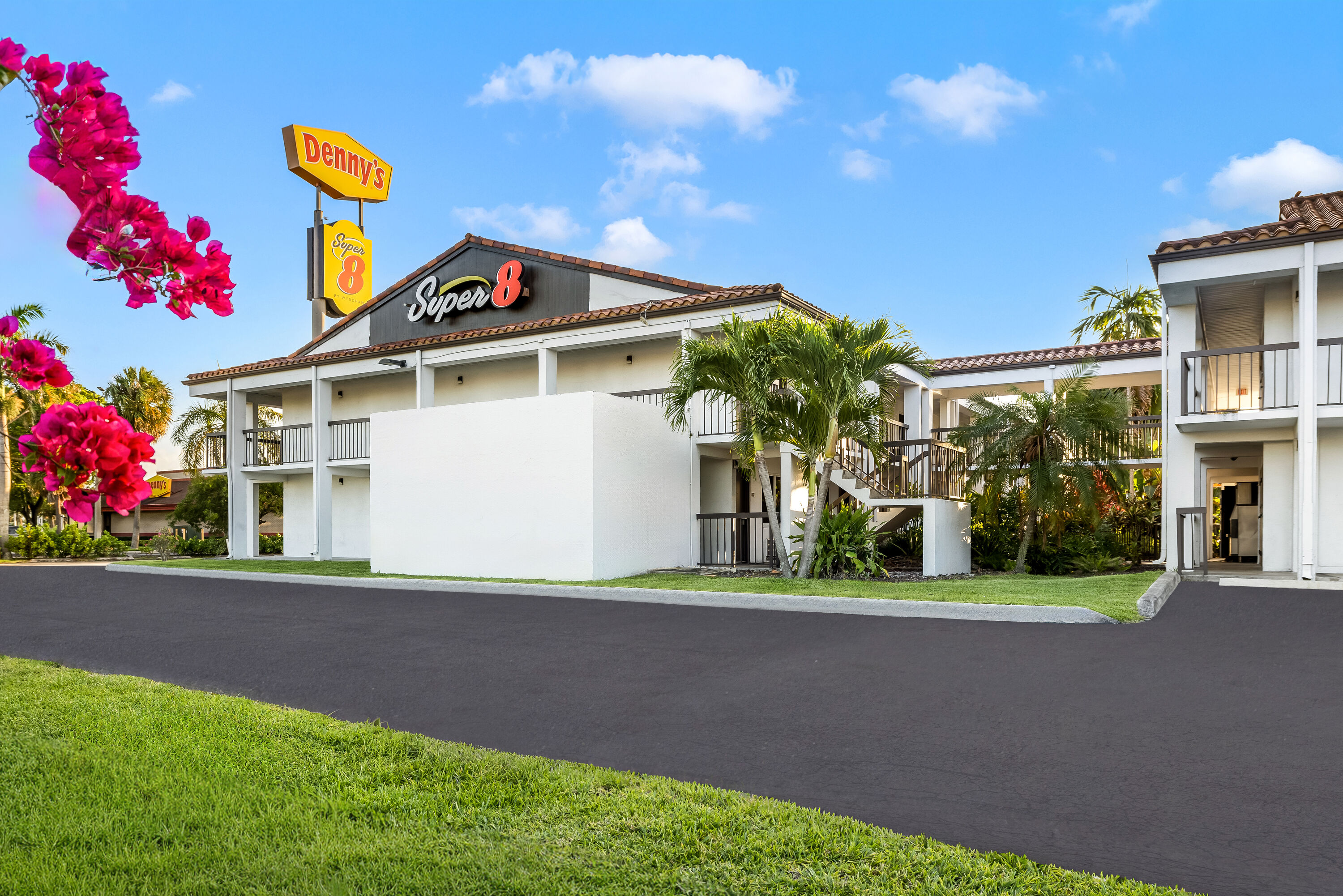 Exterior Dusk Image of Super 8 by Wyndham Riviera Beach West Palm Beach hotel in Riviera Beach, Florida