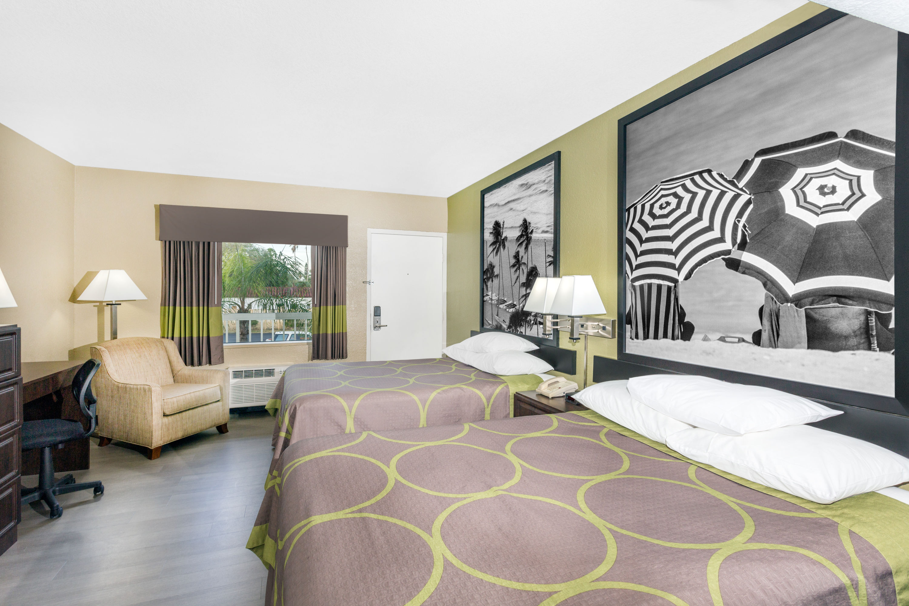 Guest room at the Super 8 by Wyndham Sarasota Near Siesta Key in Sarasota, Florida