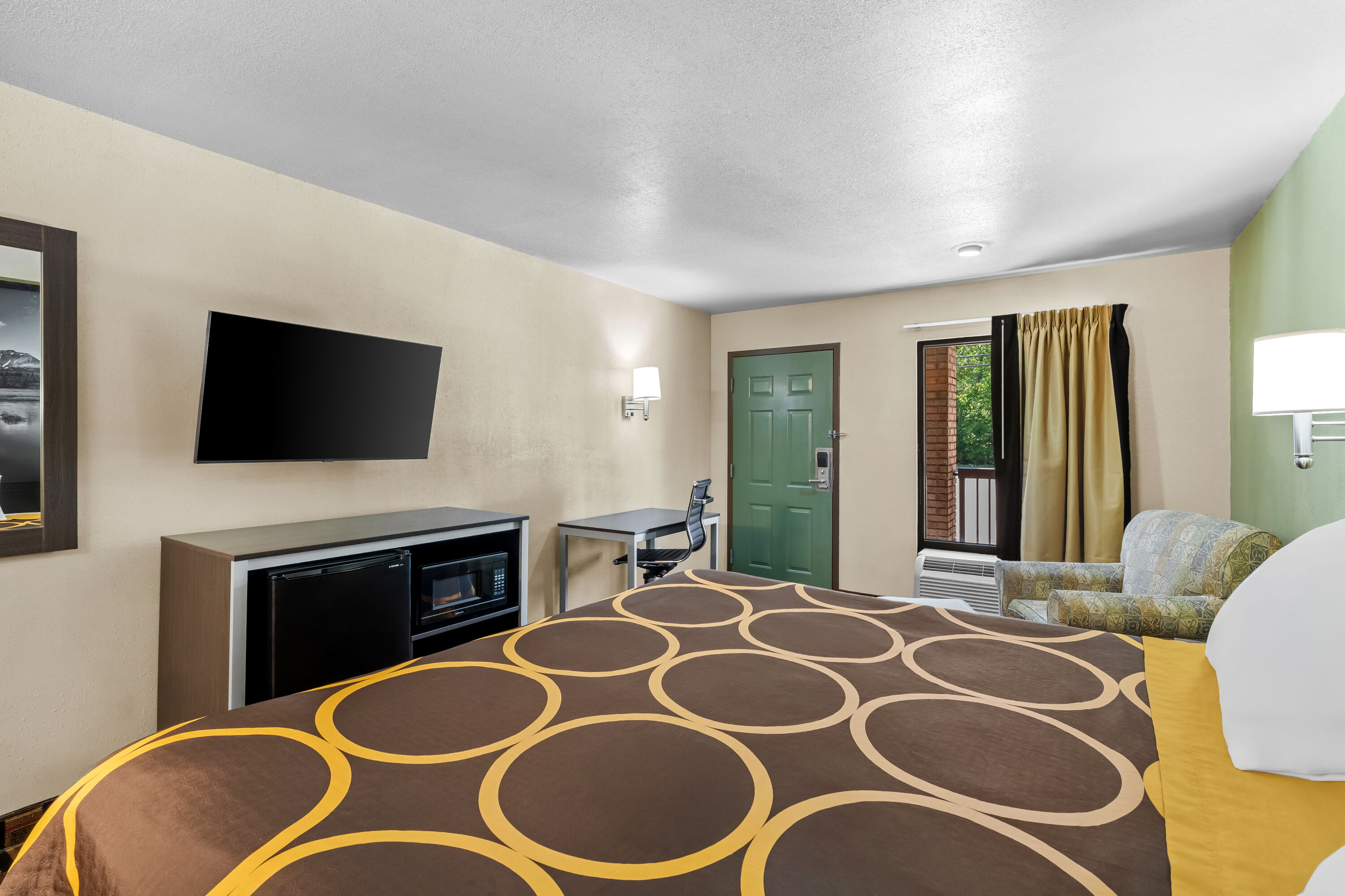 King bed guest room at the Super 8 by Wyndham Acworth/Atlanta Area in Acworth, Georgia
