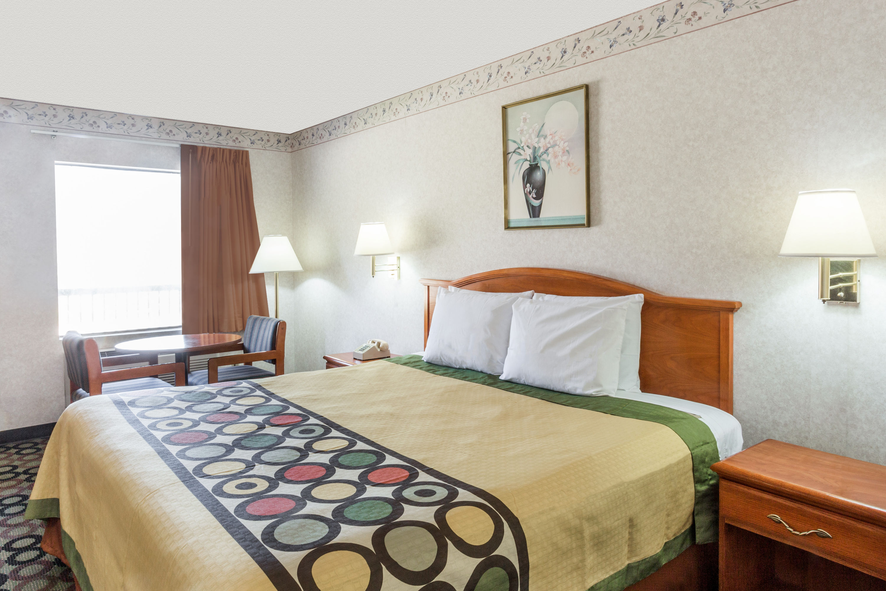 Guest room at the Super 8 by Wyndham Ashburn in Ashburn, Georgia