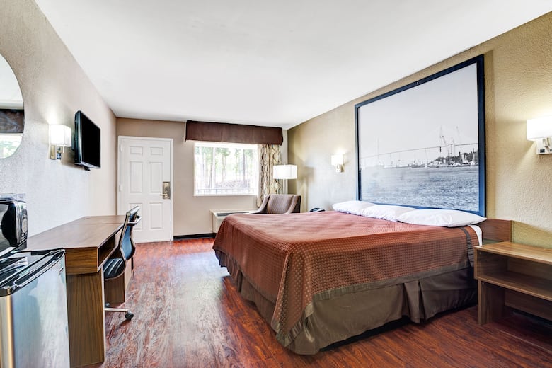 Guest room at the Super 8 Atlanta/Jonesboro Road in Atlanta, Georgia