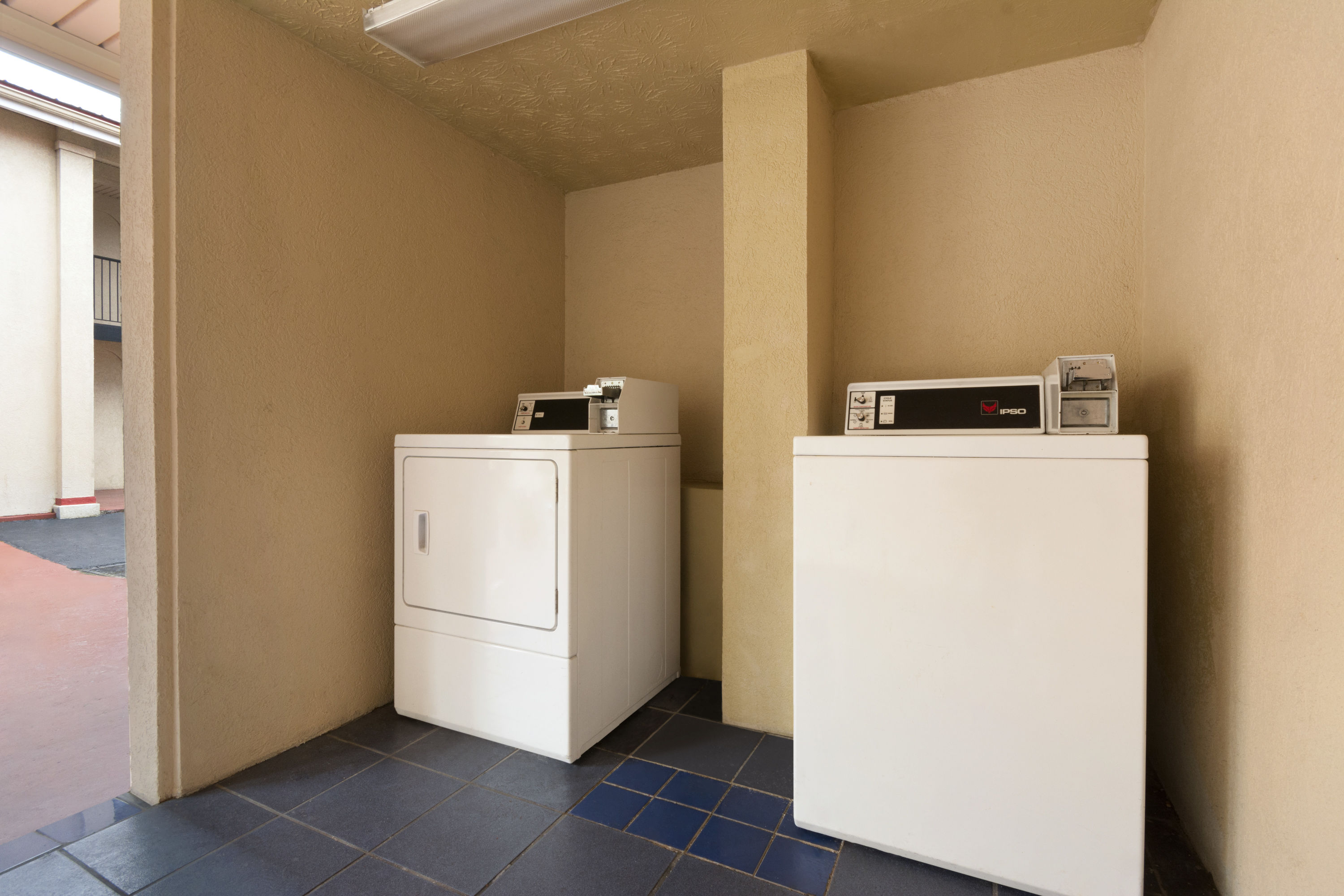 Laundry facilities at Super 8 by Wyndham Atlanta/Hartsfield Jackson Airport in College Park, Georgia