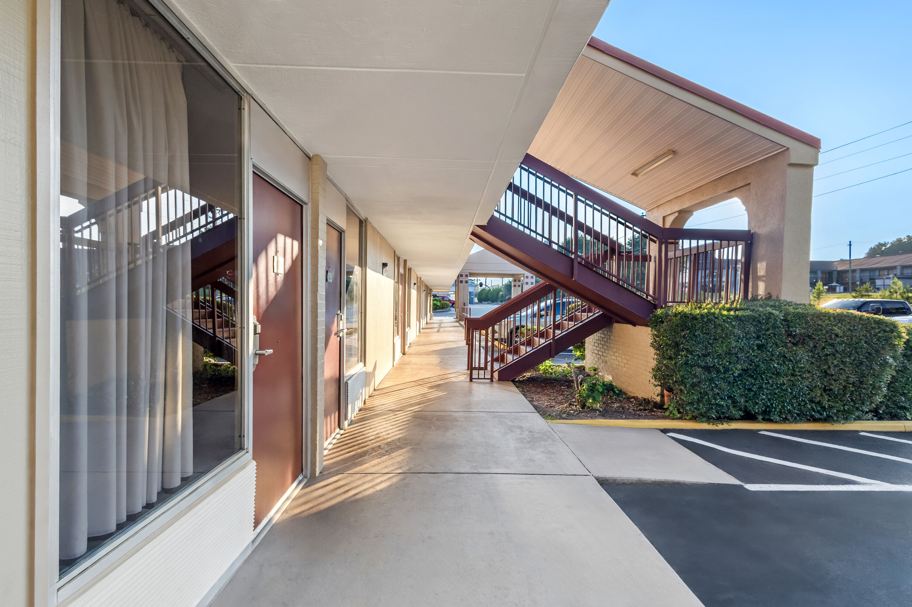 Exterior Day Image of Super 8 by Wyndham Commerce hotel in Commerce, Georgia