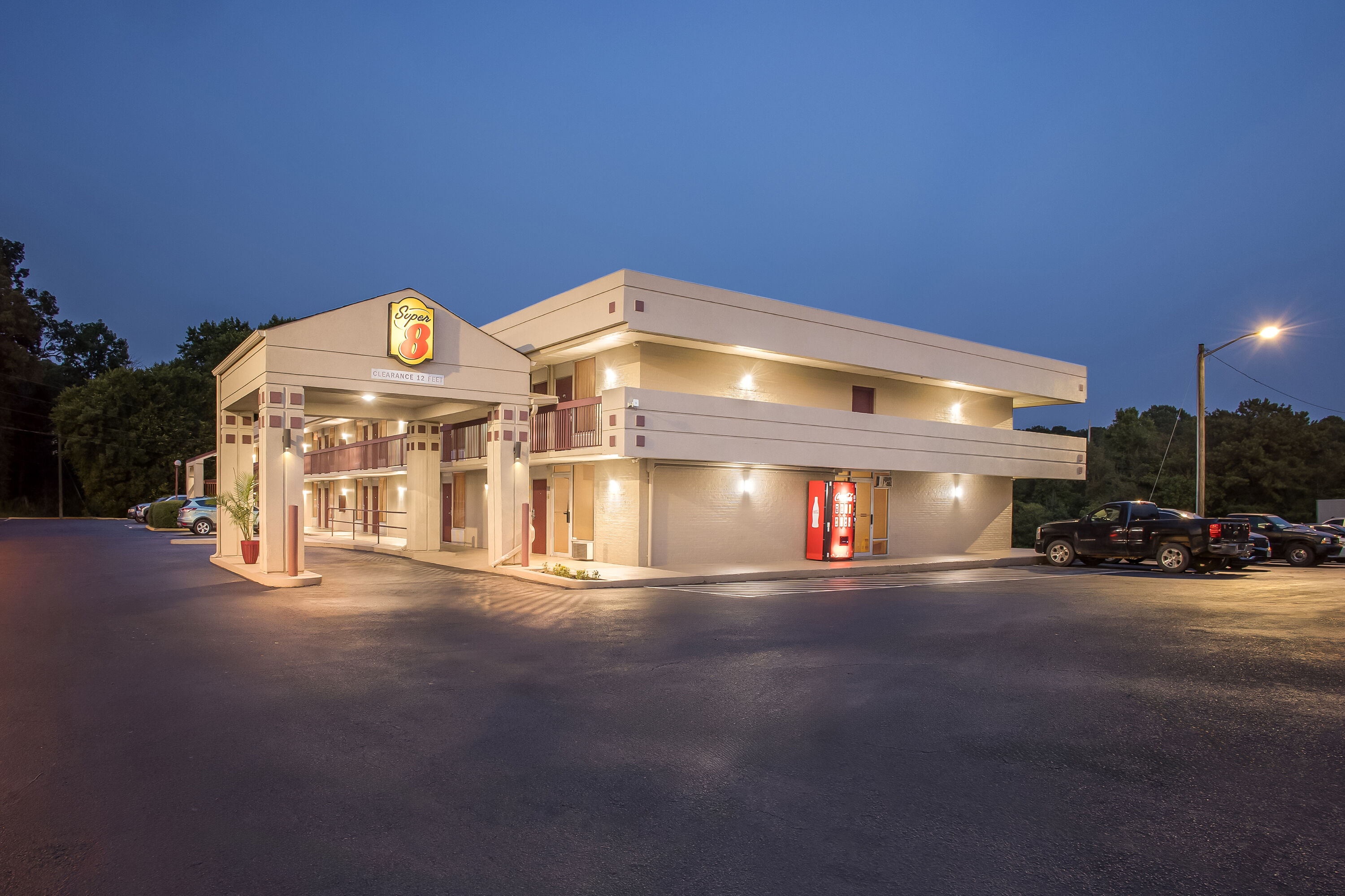 Exterior Night Image of Super 8 by Wyndham Commerce hotel in Commerce, Georgia