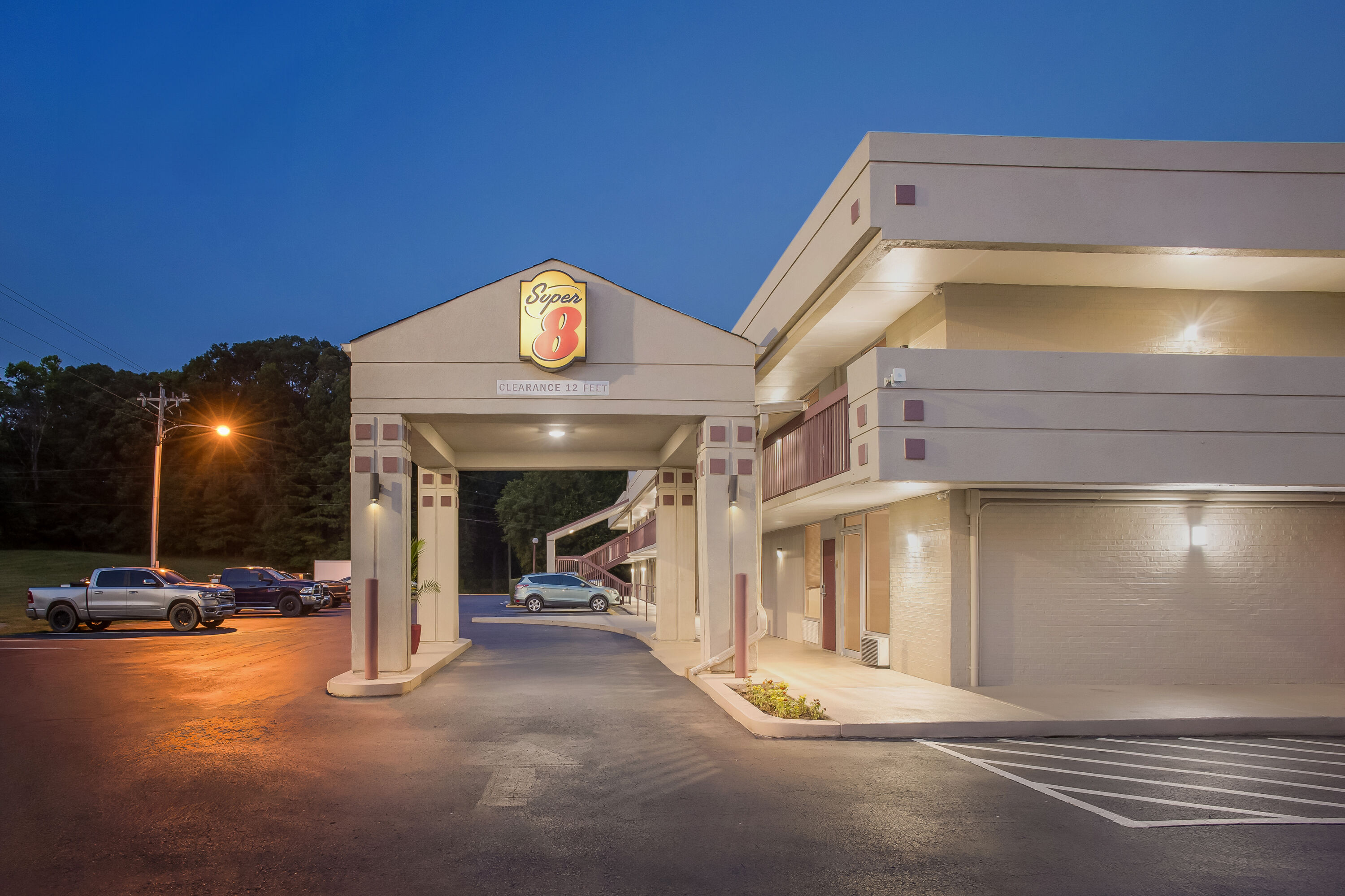 Exterior Night Image of Super 8 by Wyndham Commerce hotel in Commerce, Georgia
