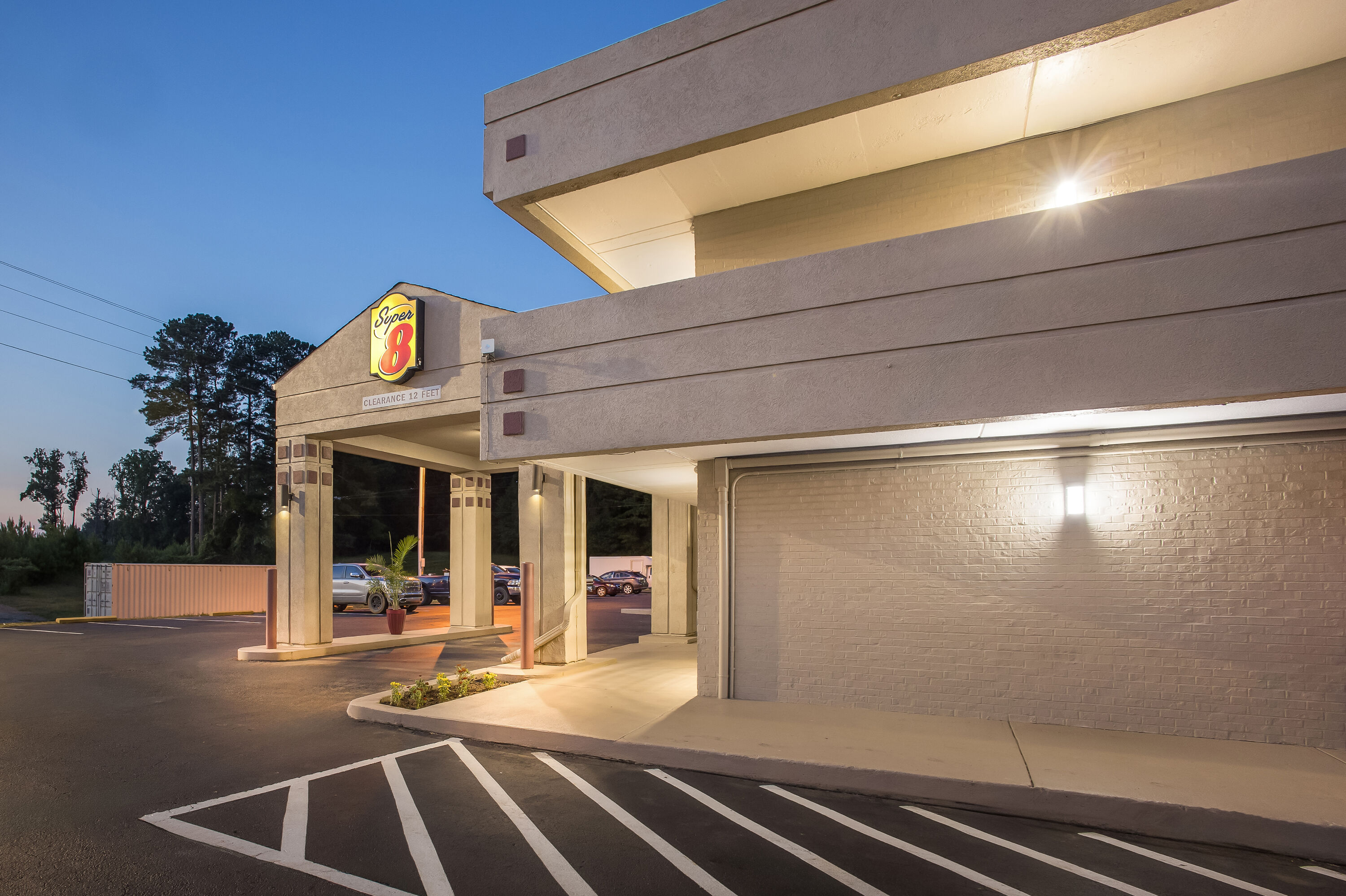 Exterior Night Image of Super 8 by Wyndham Commerce hotel in Commerce, Georgia