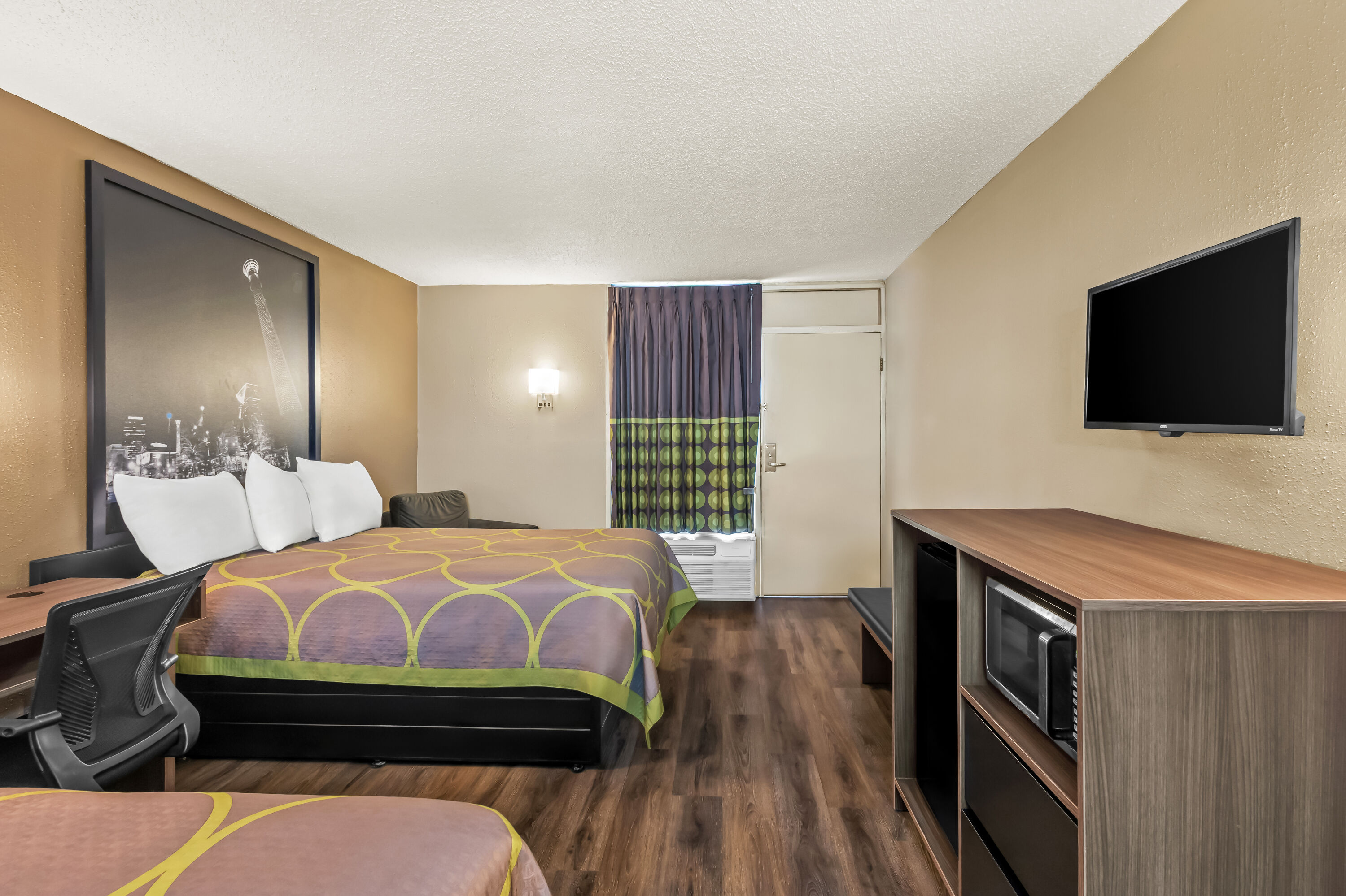 Double bed guest room at the Super 8 by Wyndham Commerce in Commerce, Georgia